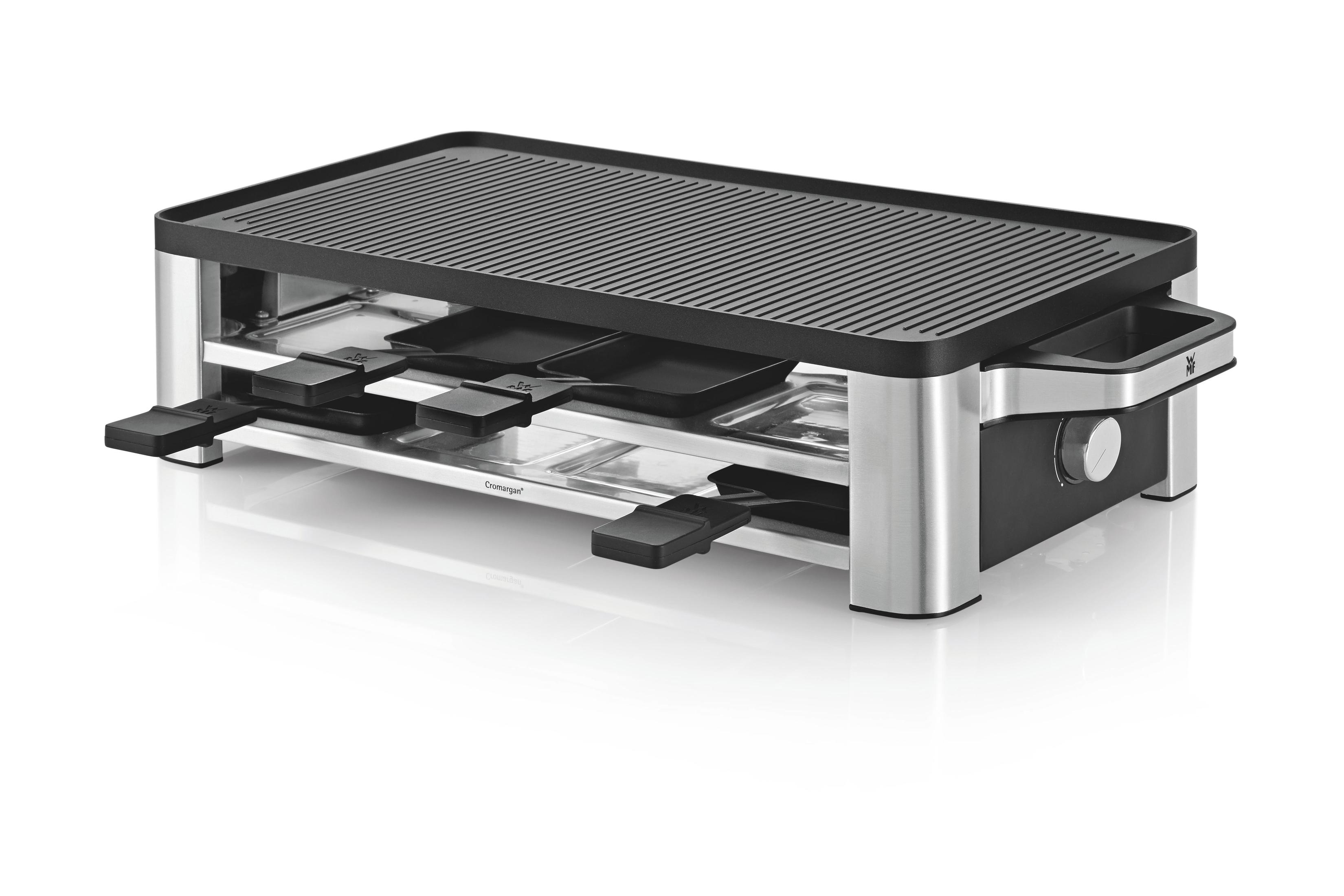 Srebrno-czarny grill do raclette z czarnym rusztem na białym tle.