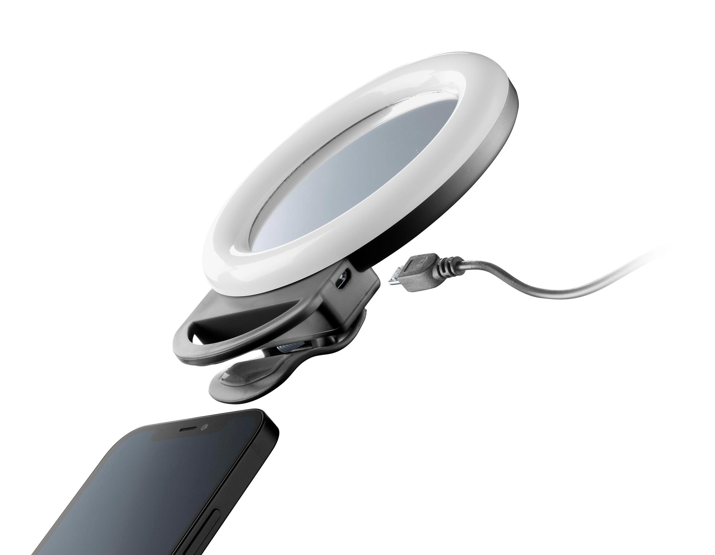 Ringlicht mit Spiegel und Clip zum Halten eines Telefons. Weißer Hintergrund.