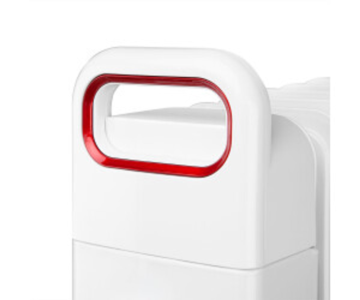 Biały uchwyt z czerwonym obramowaniem na białym przedmiocie, zbliżenie.