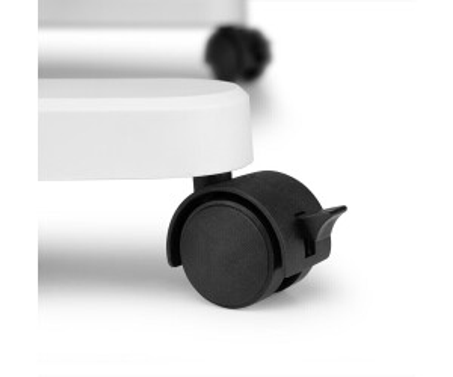 Białe kółko meblowe na białym tle. Czarne kółko.