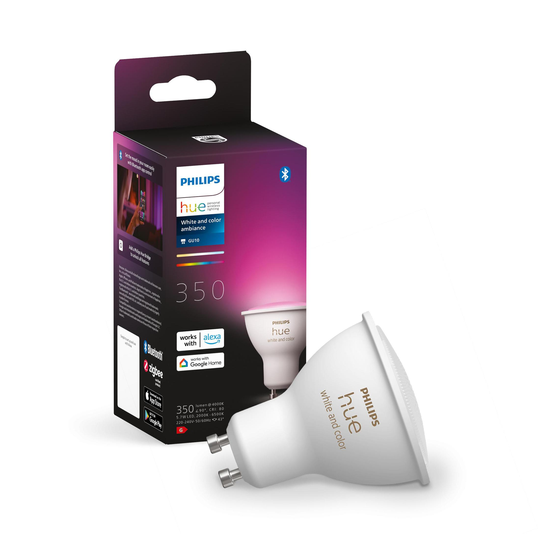 Weiße Philips Hue Glühbirne und -Box. Box hat lila und rosa Farben. Weißer Hintergrund.