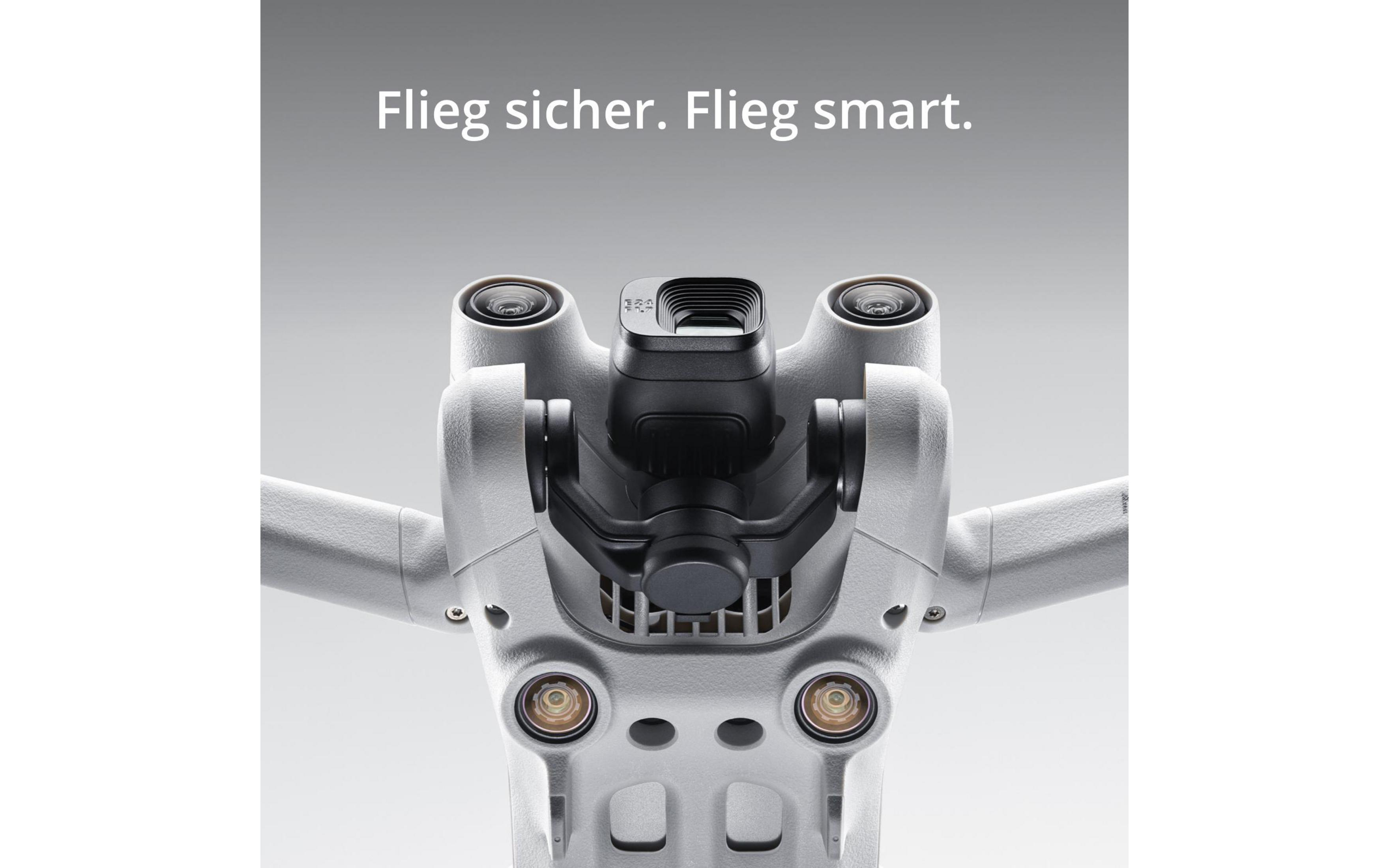 Drohne mit drei Kameras und Text: 'Fliegen Sie sicher. Fliegen Sie schlau.' auf grauem Hintergrund.