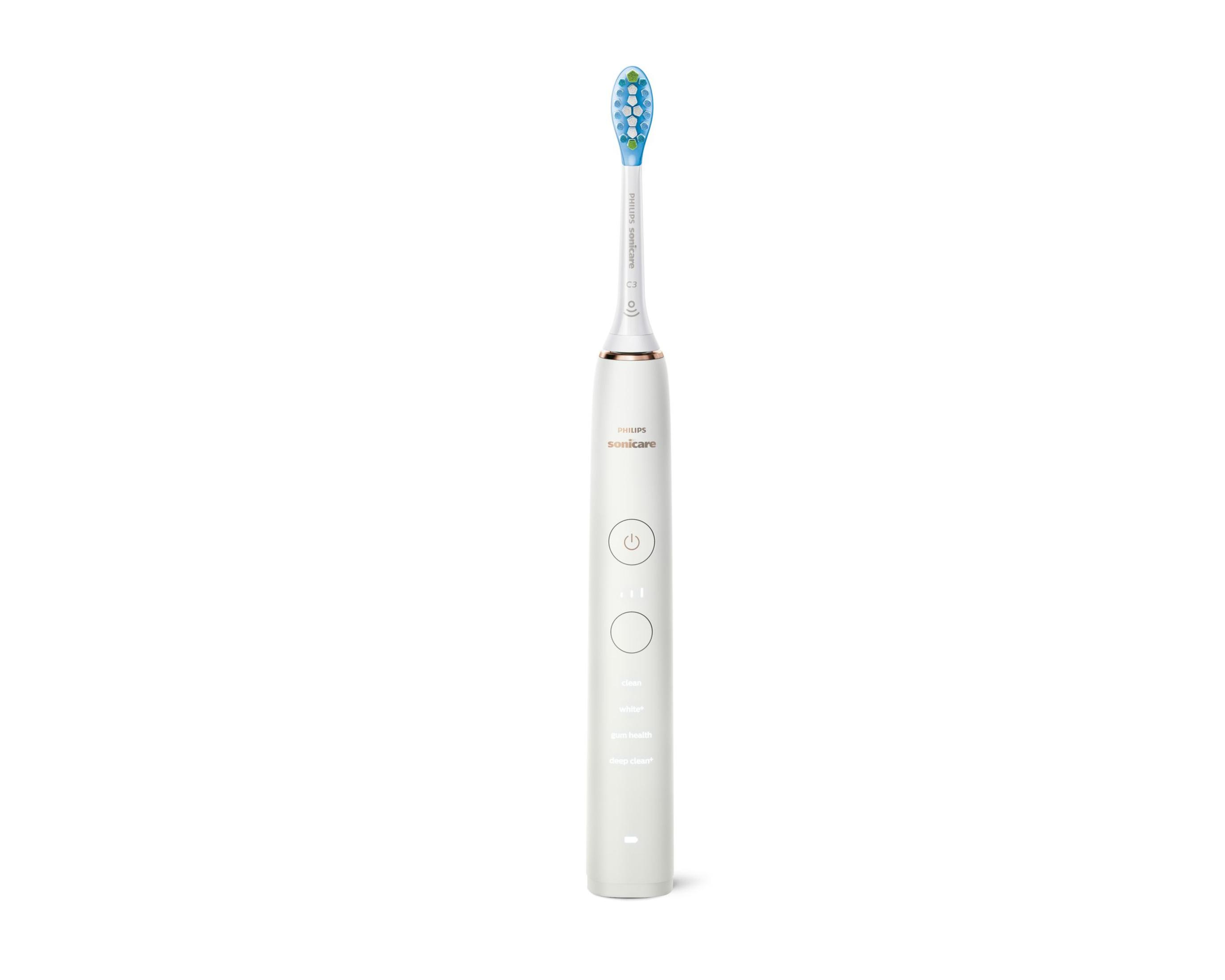 Spazzolino Philips Sonicare bianco. Ha una testina blu/verde e pulsanti.