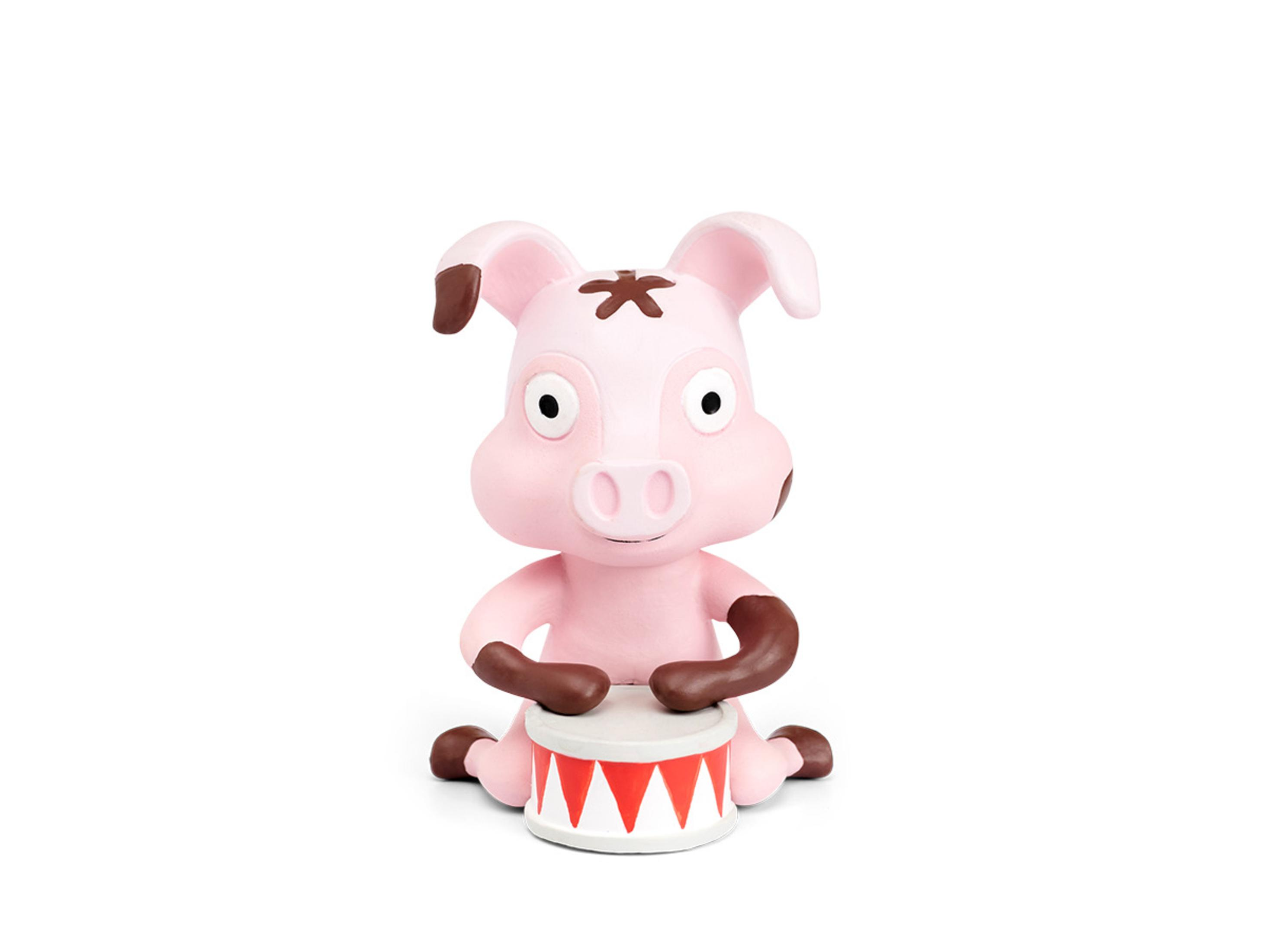 Rosa Schweinespielzeug mit braunen Flecken, das eine Trommel spielt, auf weißem Grund.