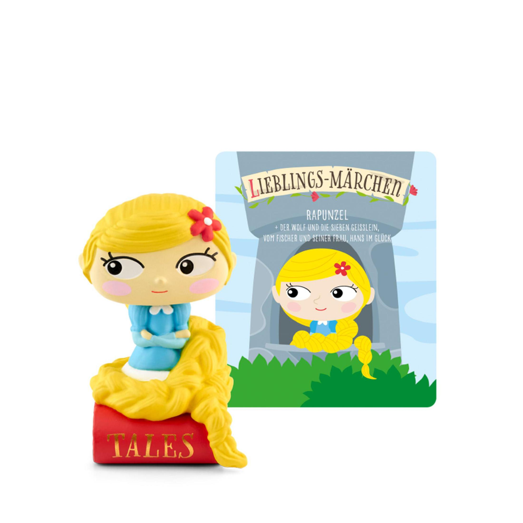 Rapunzel-Figur auf einem Buch, mit passender Illustration auf einer Karte.