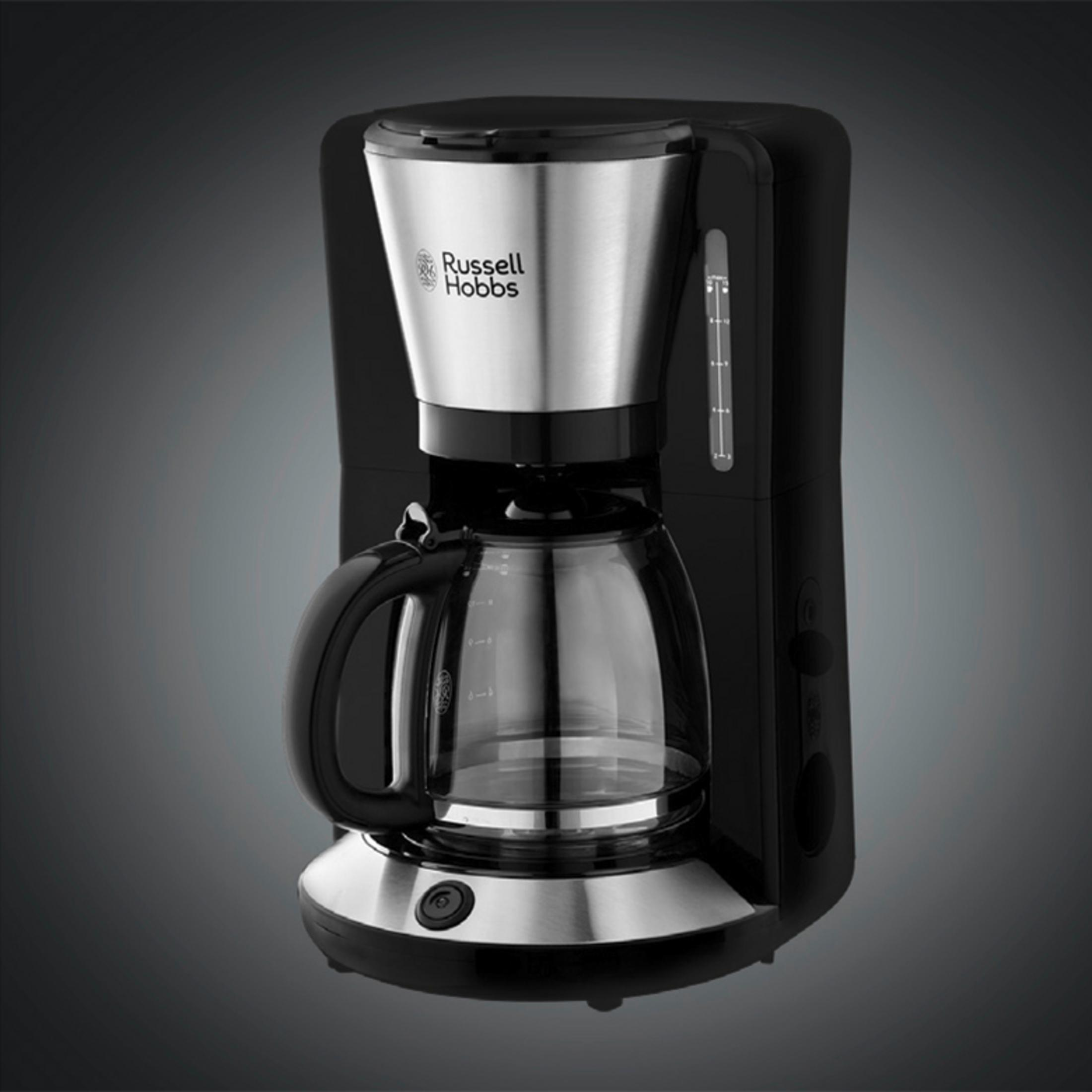 Czarno-srebrny ekspres do kawy ze szklaną karafką. Marka to "Russell Hobbs".