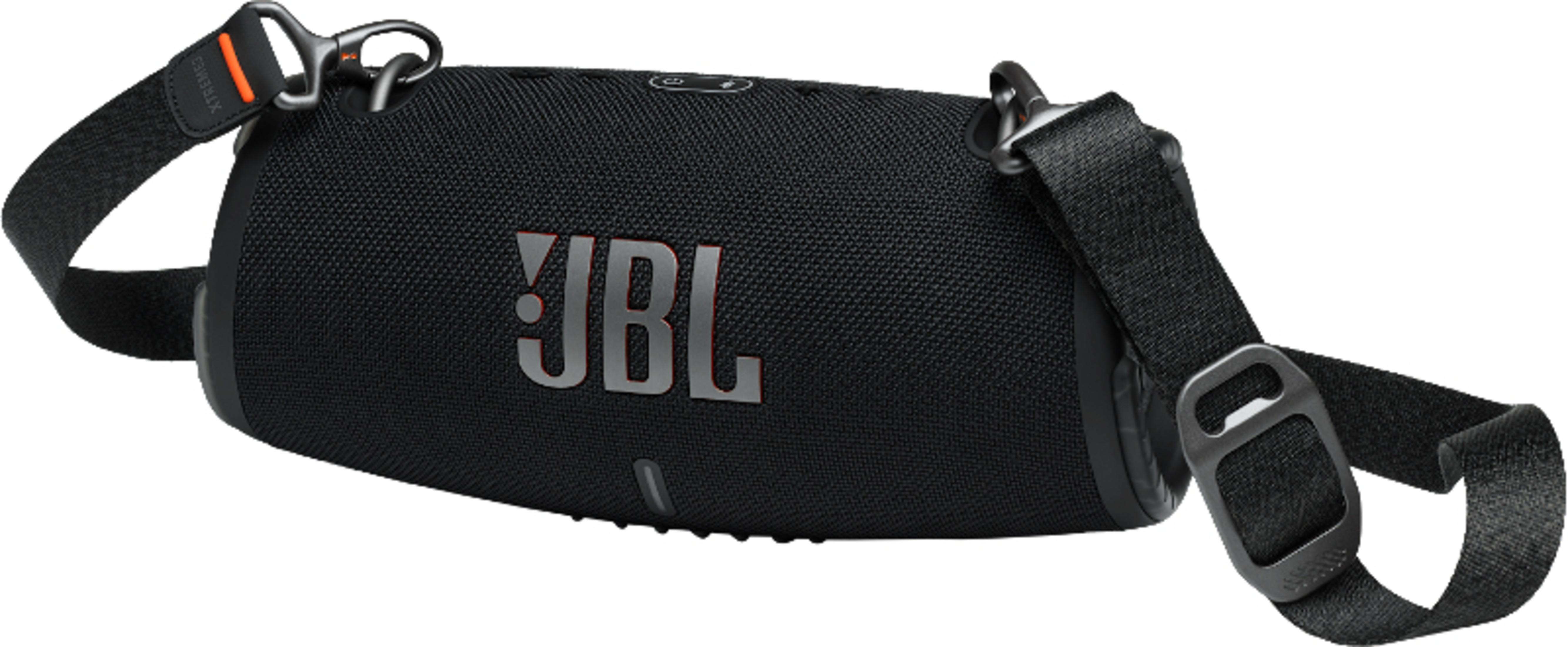 Un altavoz JBL negro con correa. El logotipo de JBL es visible en rojo.