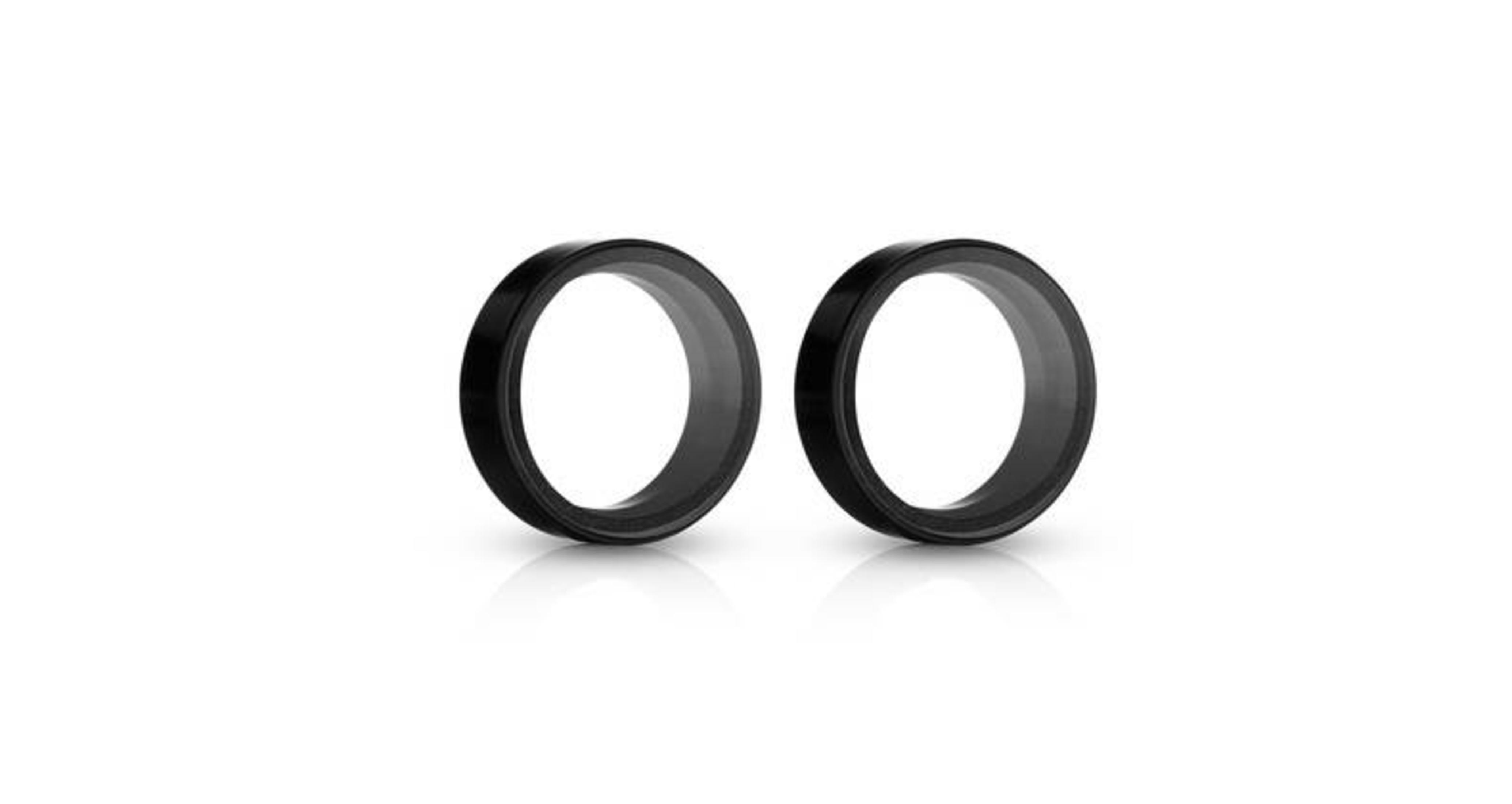 Dos filtros de lente negros, redondos con borde negro, aislados sobre fondo blanco.