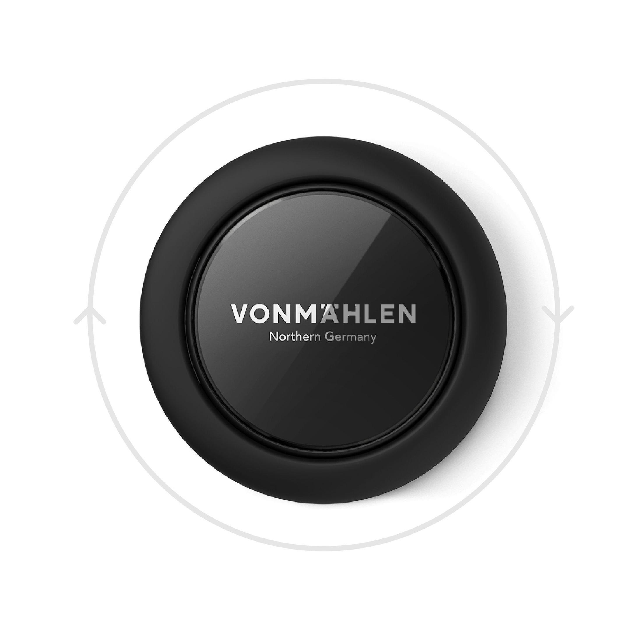 Schwarzes rundes Gerät mit 'VONMÄHLEN'-Text. Weiße Pfeile drum herum. Weißer Hintergrund.