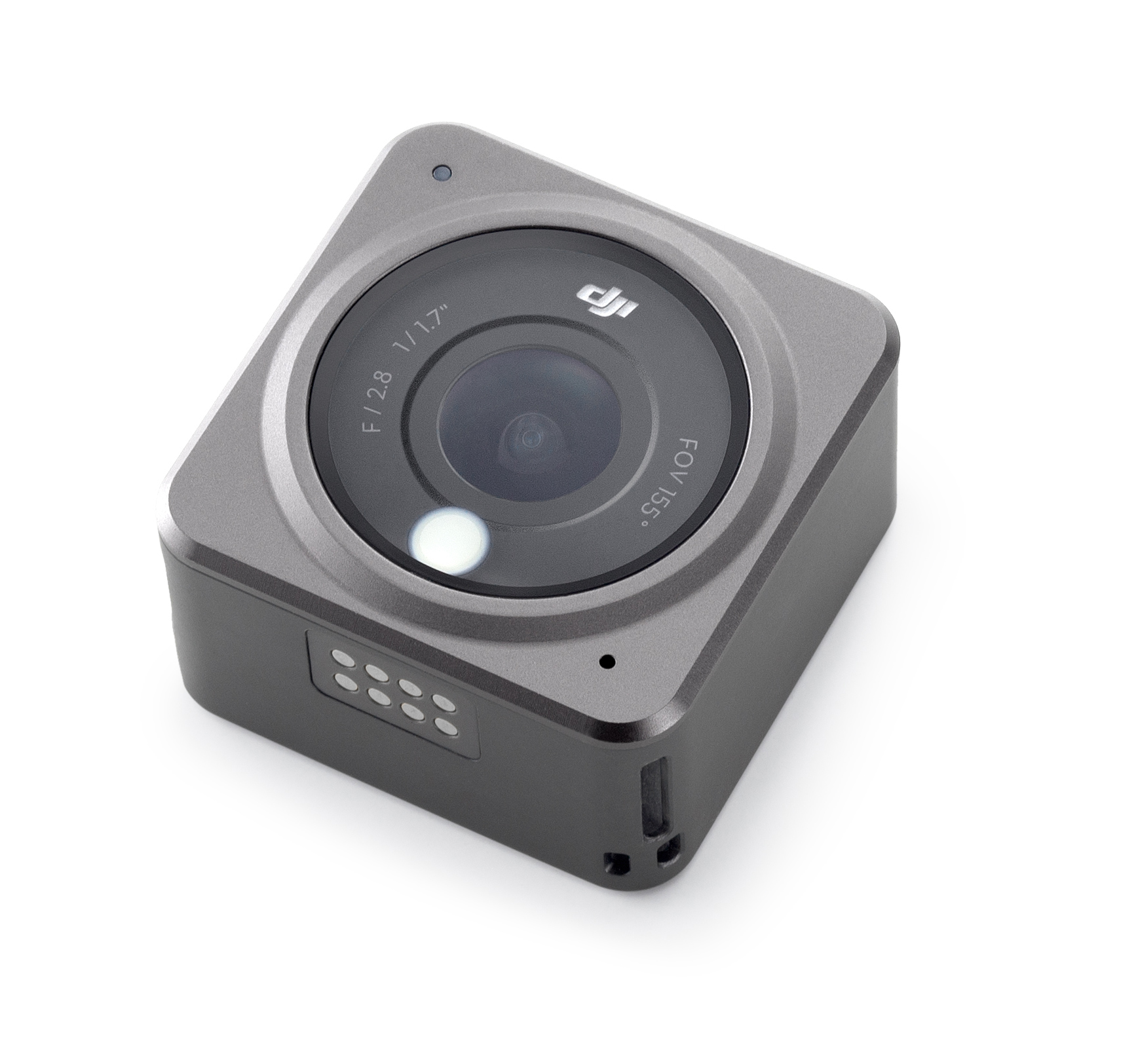 Graue quadratische Kamera mit Objektiv und mehreren kleinen Löchern. Sie befindet sich auf weißem Hintergrund.