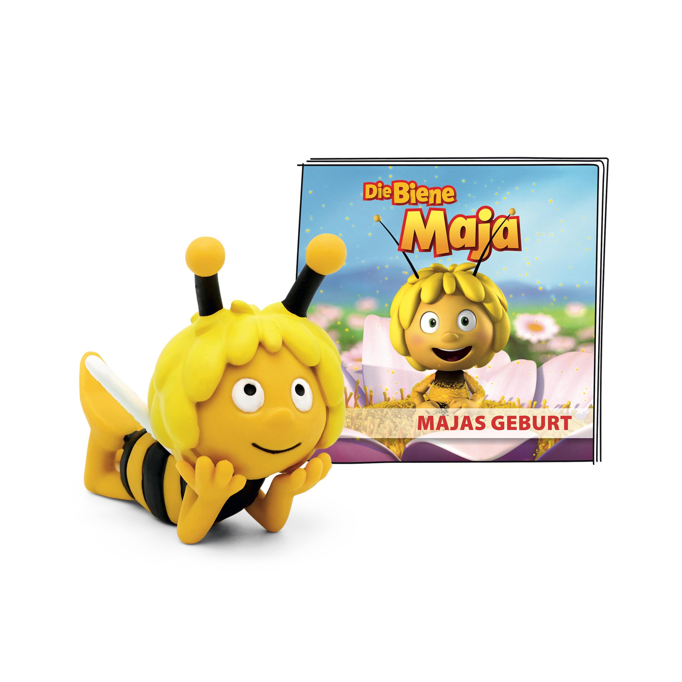 Figurine Maya l'abeille et une couverture de livre. L'abeille est jaune avec des rayures noires, sur fond blanc.