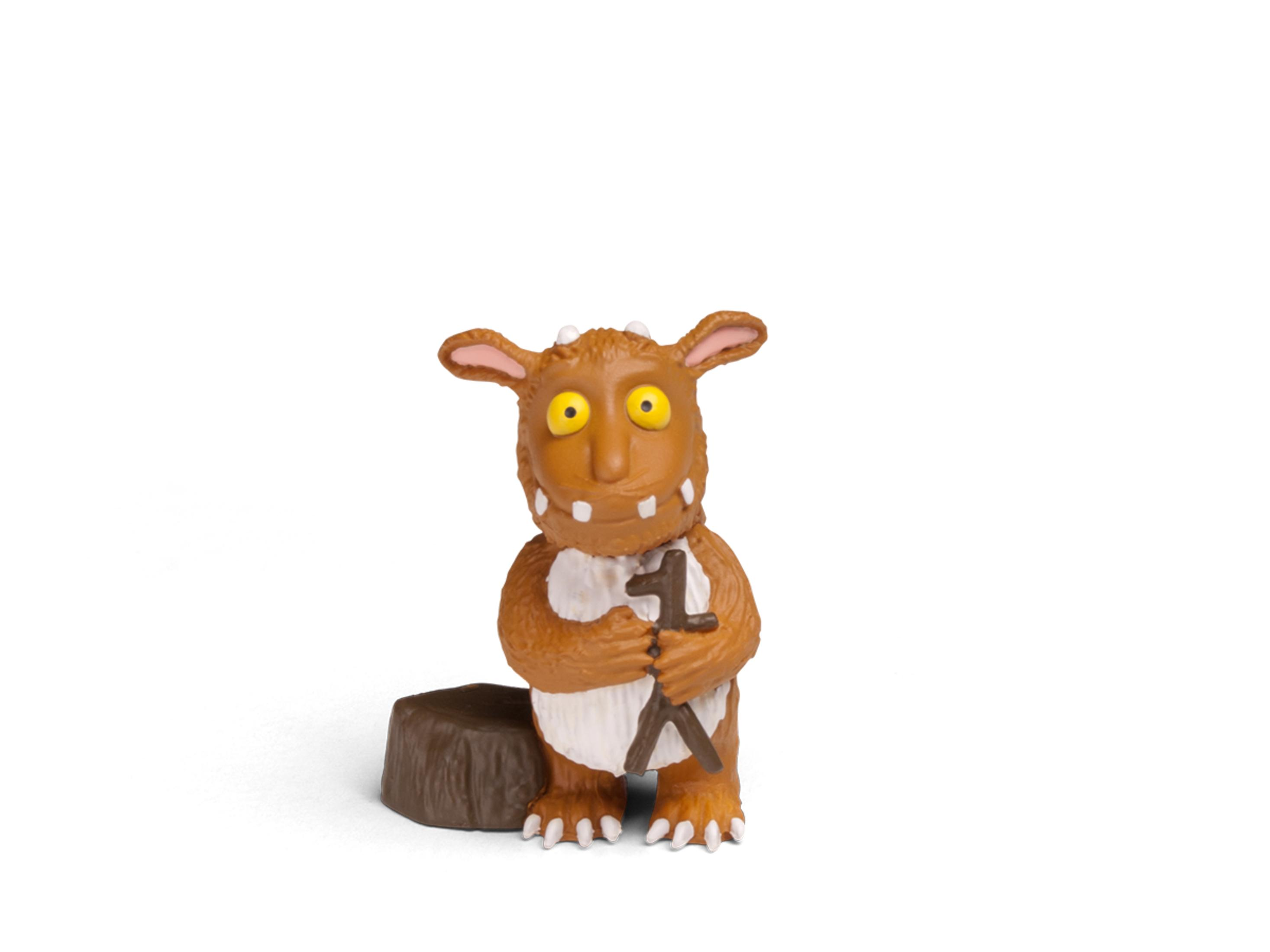 Eine braune Gruffalo-Figur mit der Zahl eins, stehend auf einem kleinen Baumstumpf.