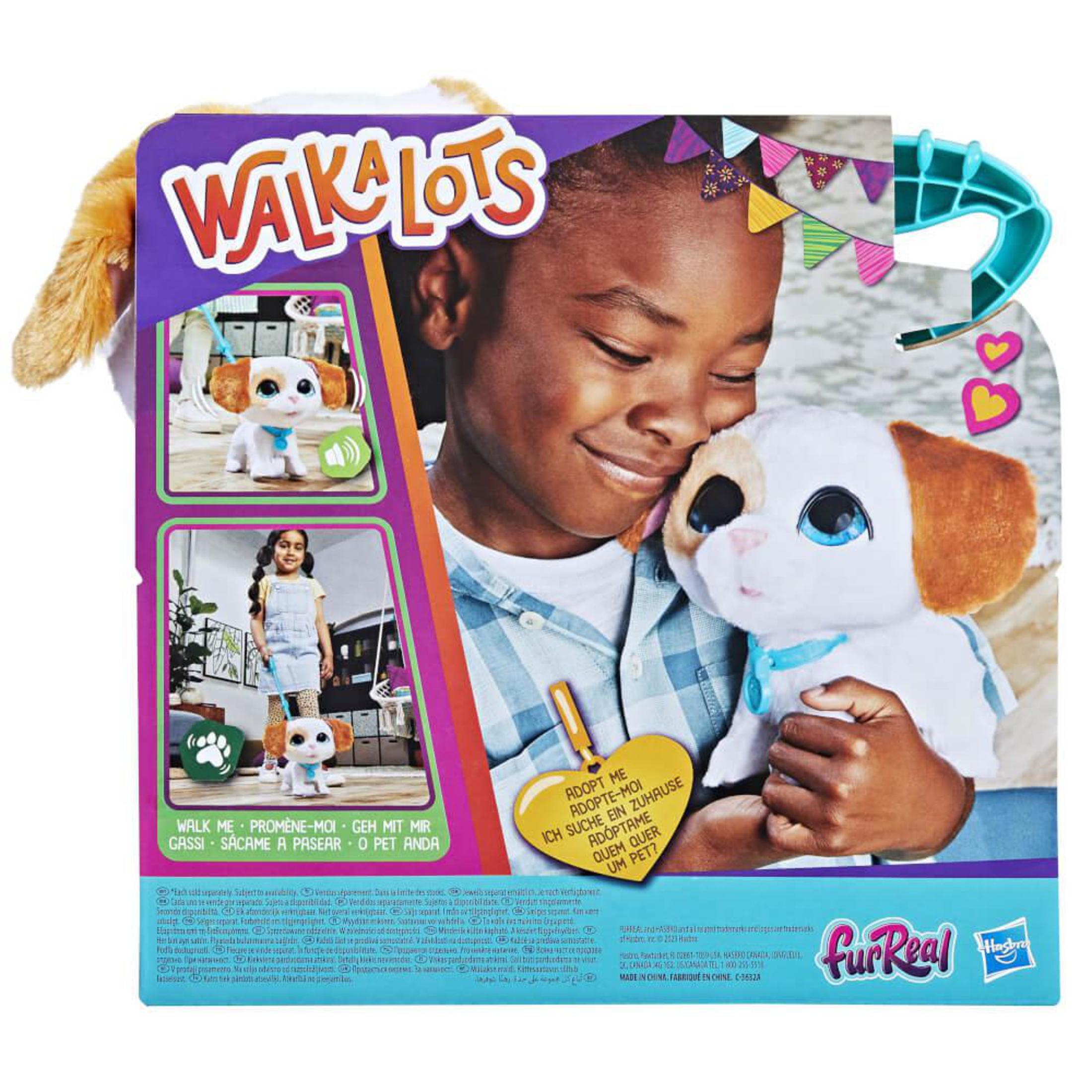 Dziecko przytula zabawkę psa. Pudełko pokazuje psa zabawkę, tekst i obrazy.