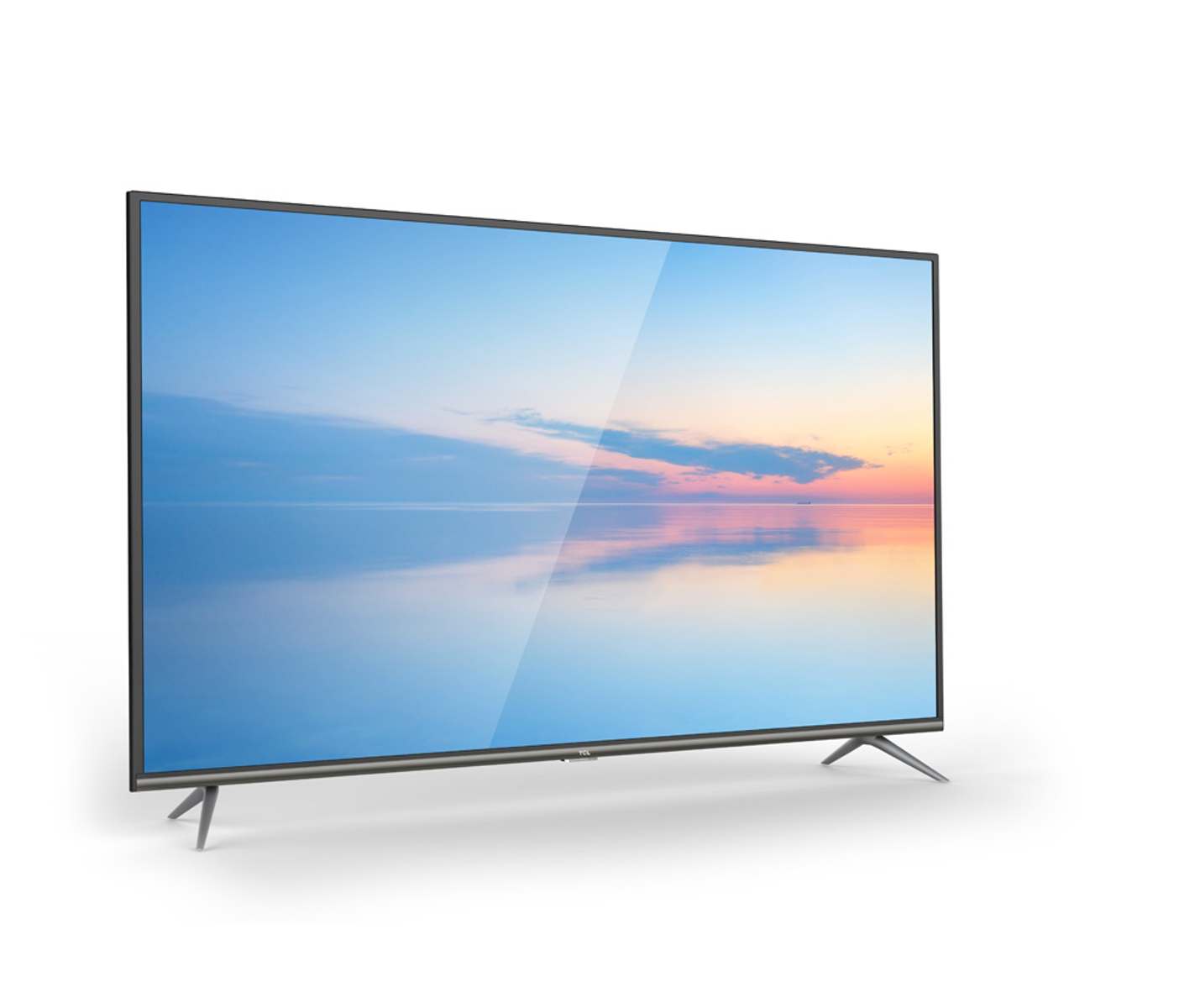 TV TCL con una scena paesaggistica sullo schermo. Cielo blu, acqua e tramonto. Sfondo bianco.