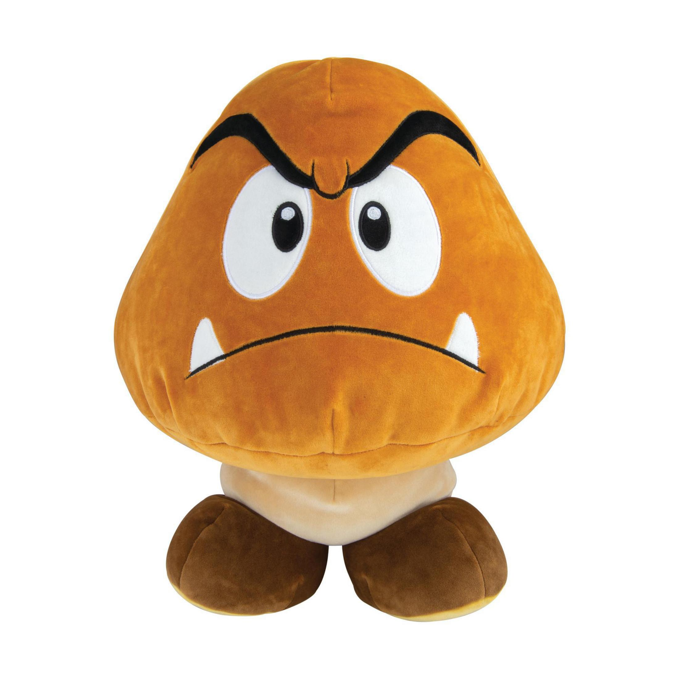 Braunes Goomba-Plüschtier. Es hat ein wütendes Gesicht, weiße Augen und einen beigefarbenen Sockel.