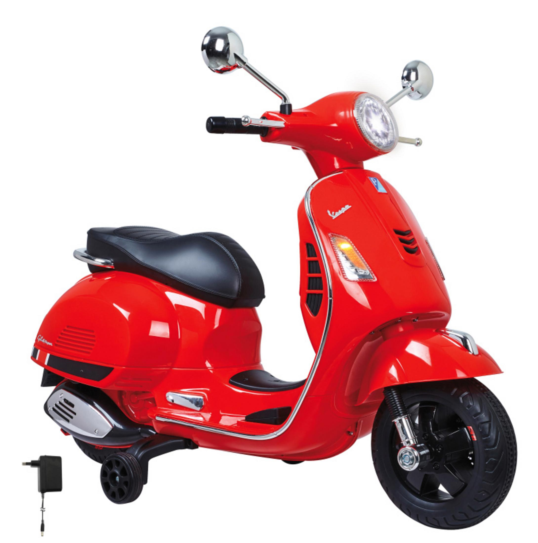 Juguete de scooter Vespa rojo con asiento y ruedas negras. Fondo blanco.