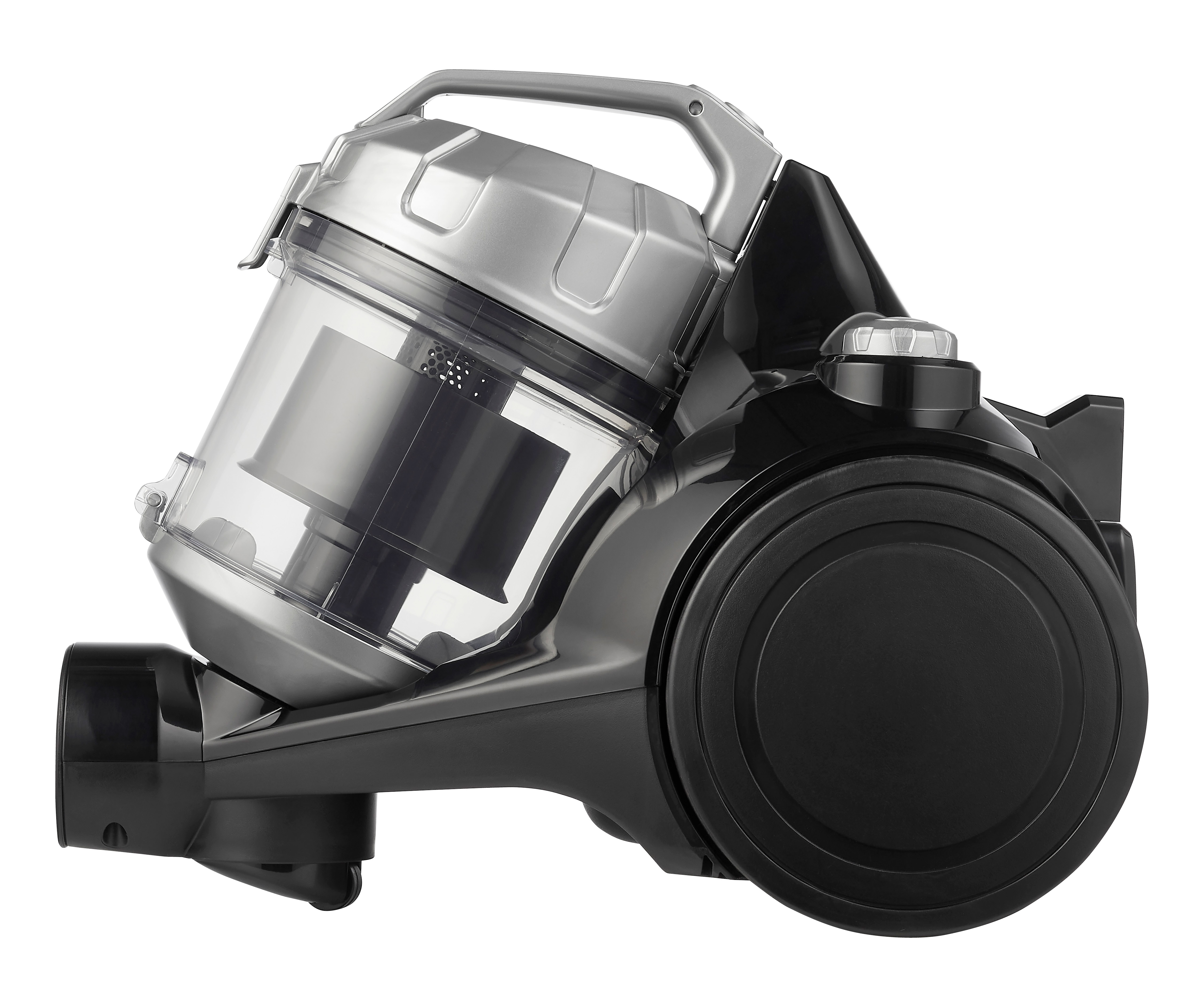 Black vacuum cleaner, close-up. The dust container is visible and the machine is on a white surface.