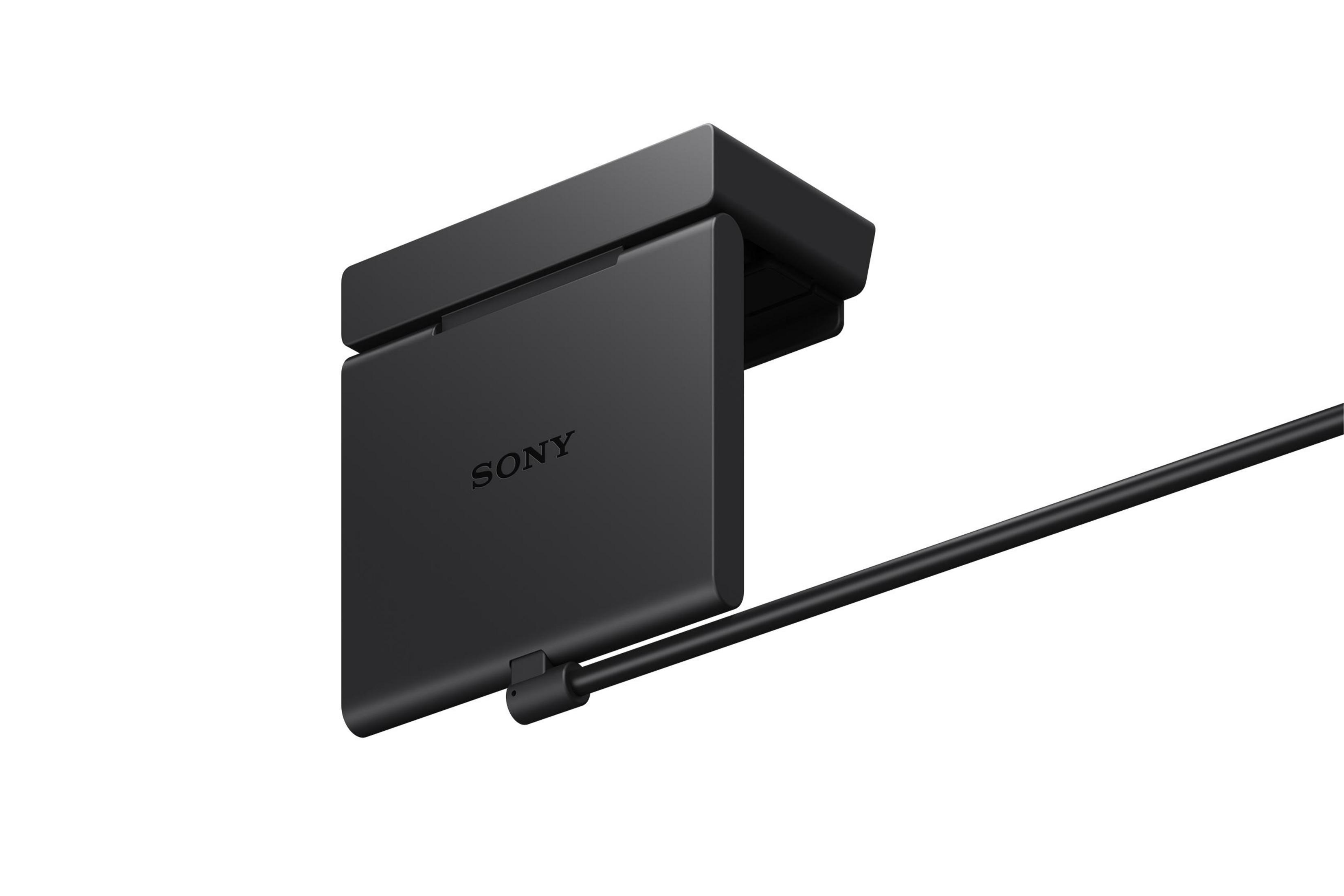 Dispositivo Sony nero con un cavo. Rettangolare con il logo Sony.