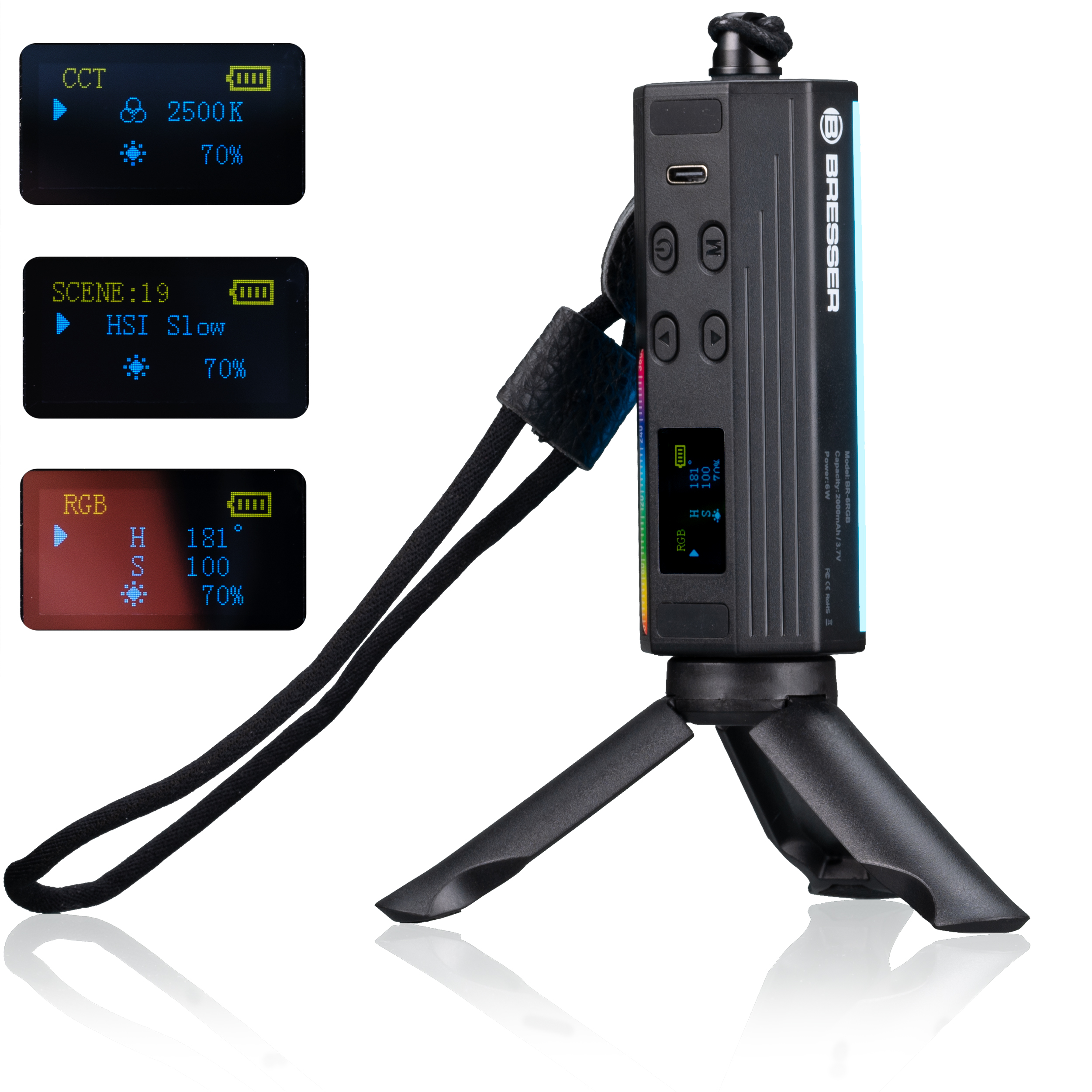 Luz portátil negra con pantalla y controles. Tiene un trípode pequeño adjunto.