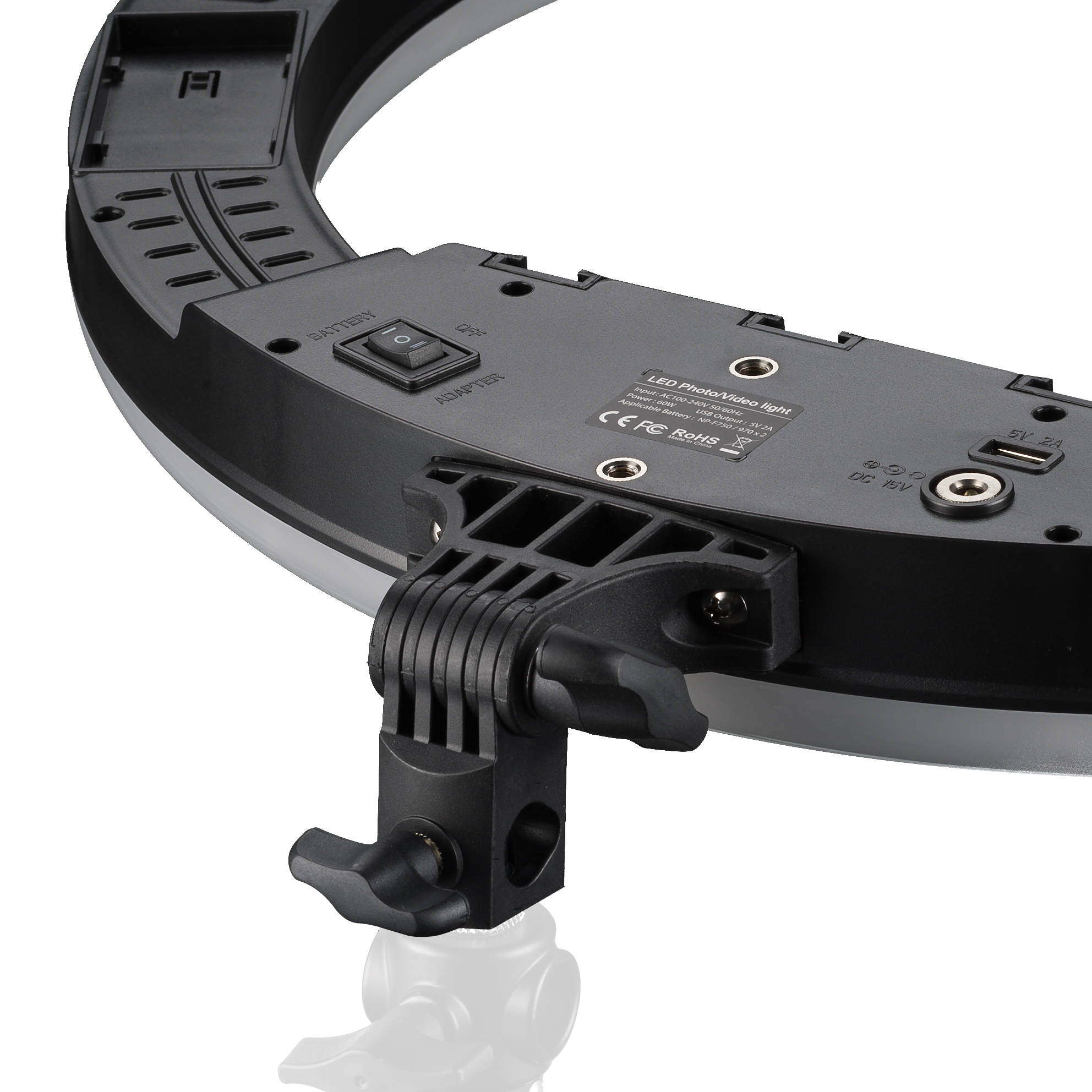 Luz LED en anillo con un soporte negro. Parte trasera con botones y un accesorio para soporte.
