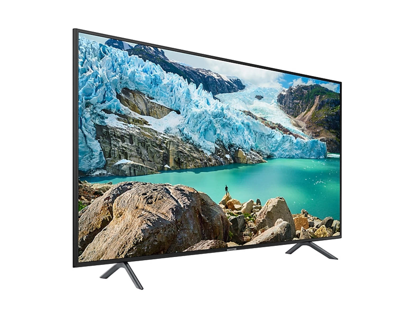 TV che mostra un paesaggio glaciale. La TV è su un supporto su sfondo bianco.