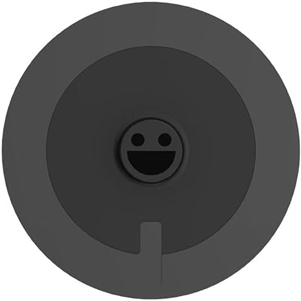 Okrągłe, czarne urządzenie z uśmiechniętą twarzą. Posiada mały zaczep.