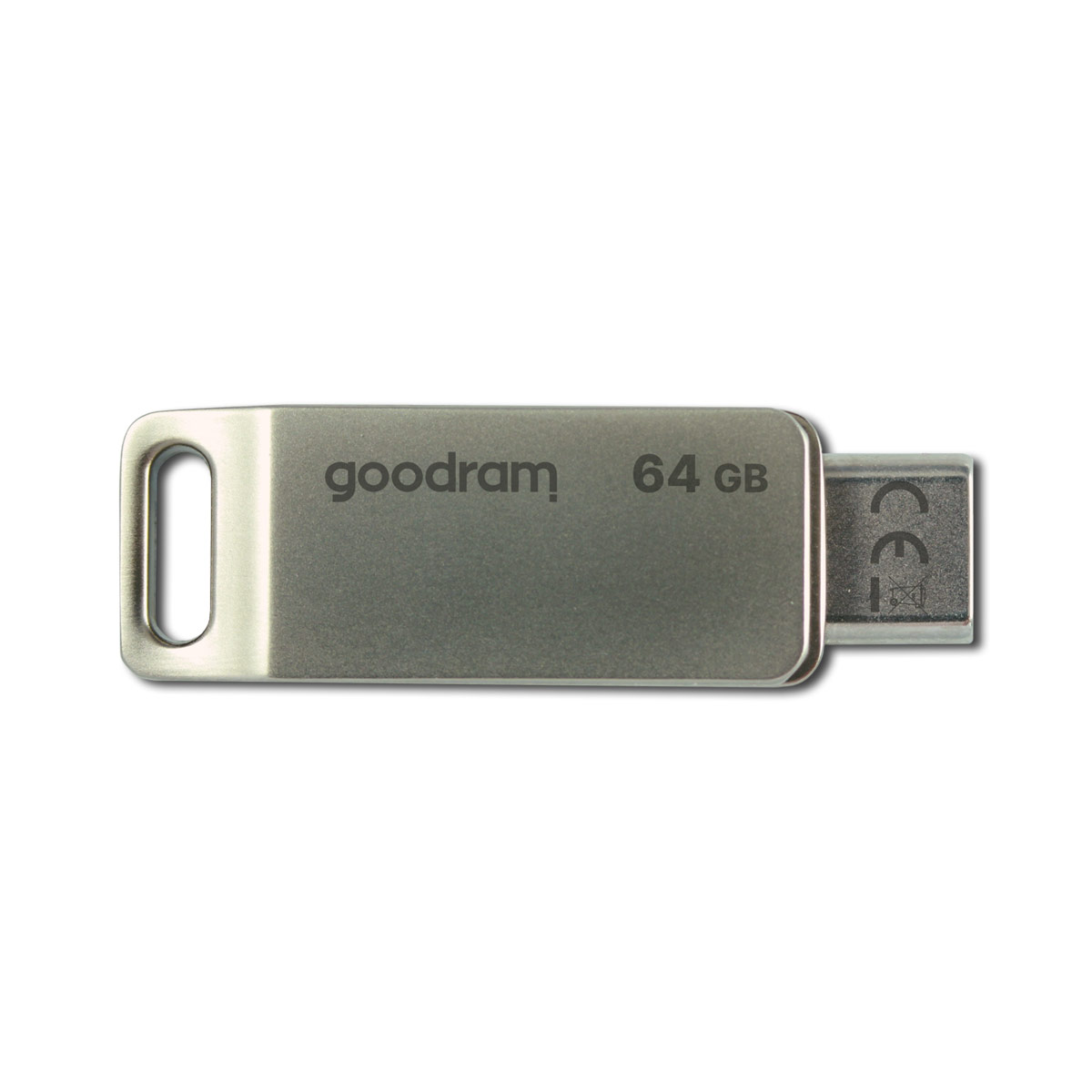 Srebrny pendrive z napisem 'goodram 64 GB'. Jest na białym tle.