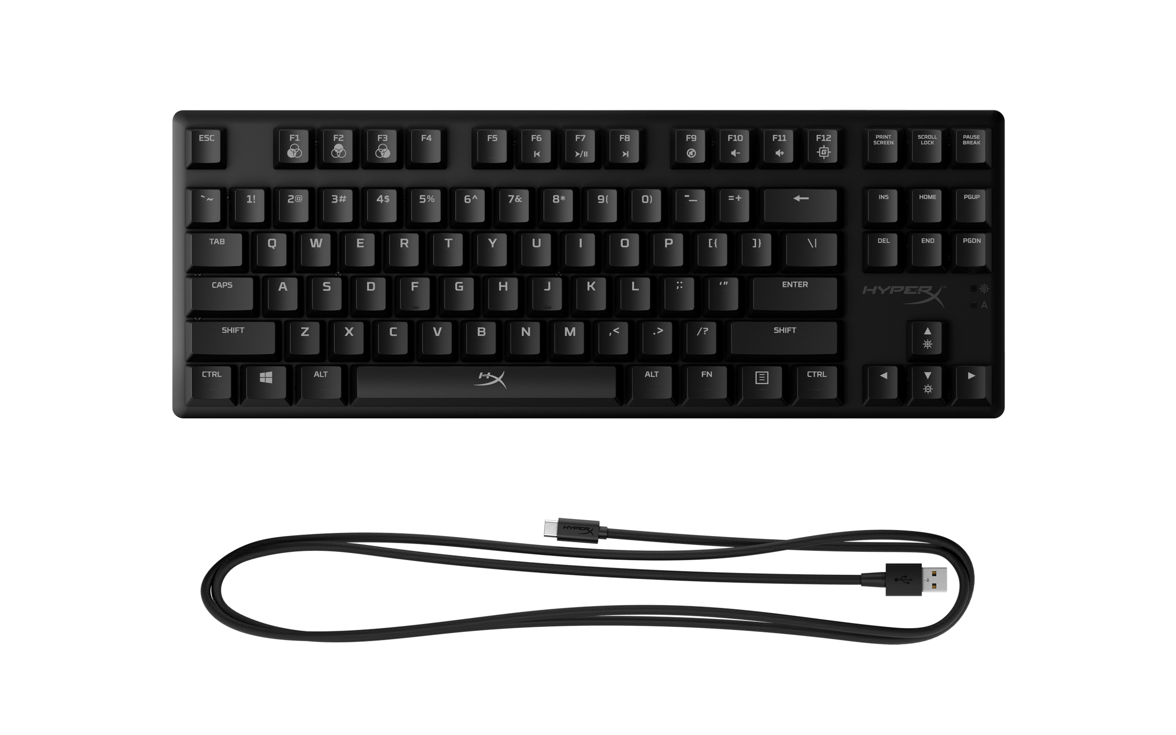 Teclado negro con teclas blancas y cable USB, plano sobre una superficie blanca.