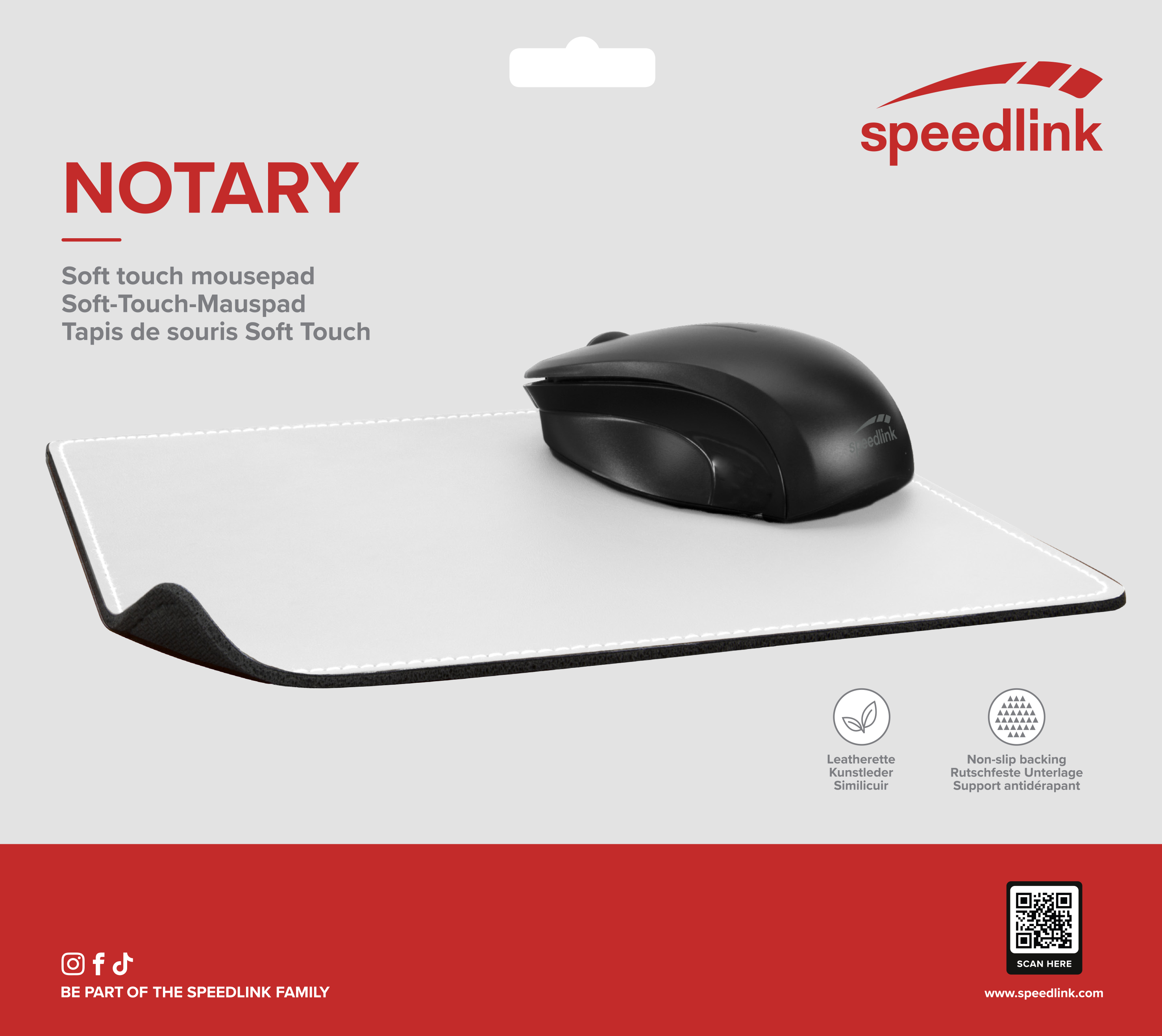 Zwarte muis op een witte muismat. Speedlink merk. Tekst in het Engels en Duits.