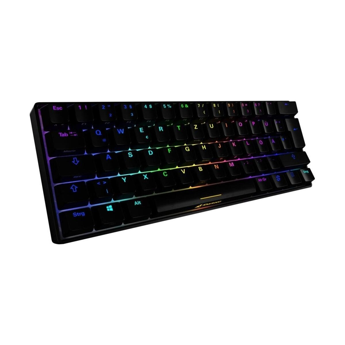 Una tastiera nera e compatta con tasti colorati arcobaleno. La tastiera ha alcuni tasti funzione.