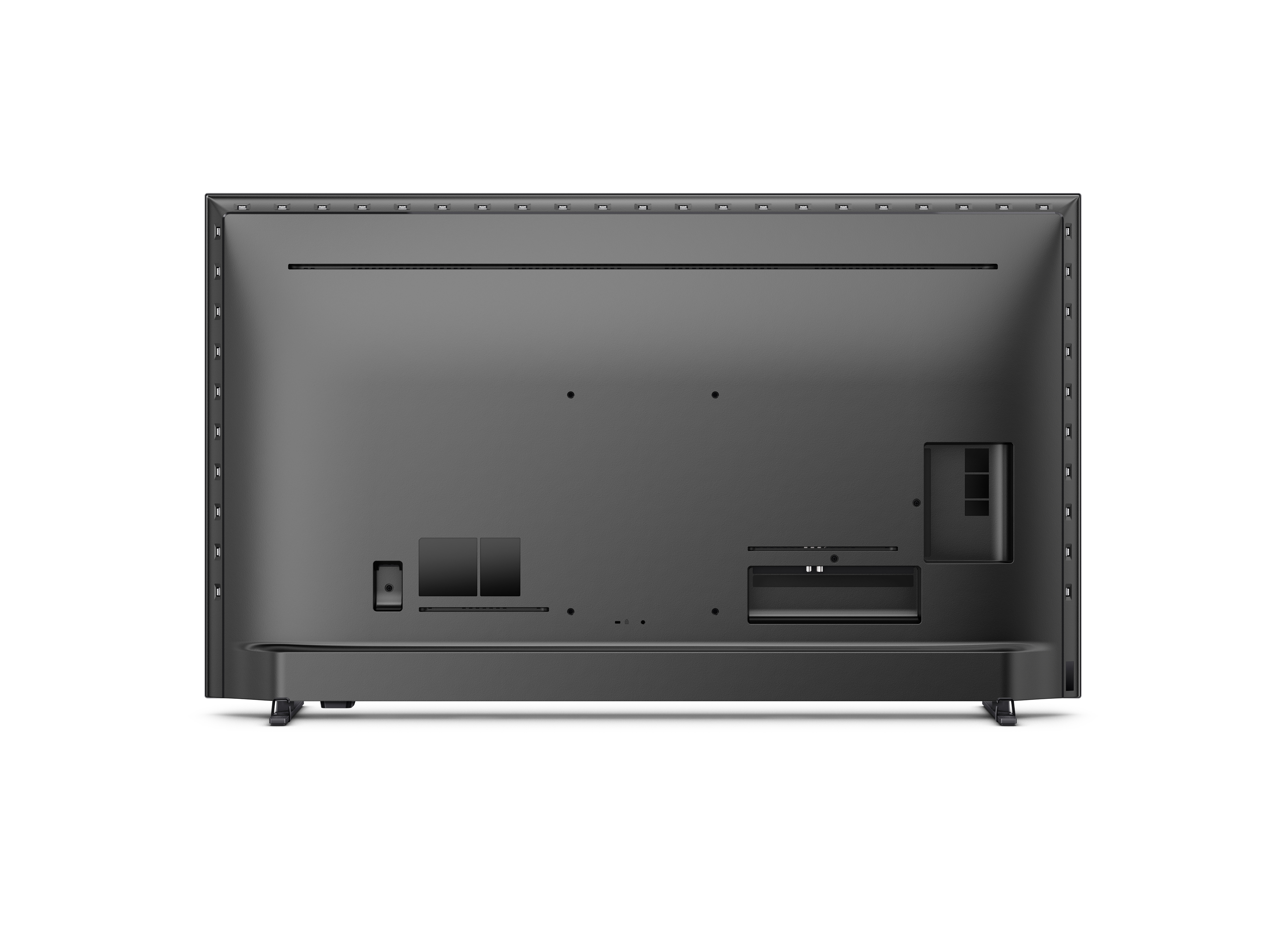 Parte trasera de un televisor negro. Muestra varios puertos y un soporte.