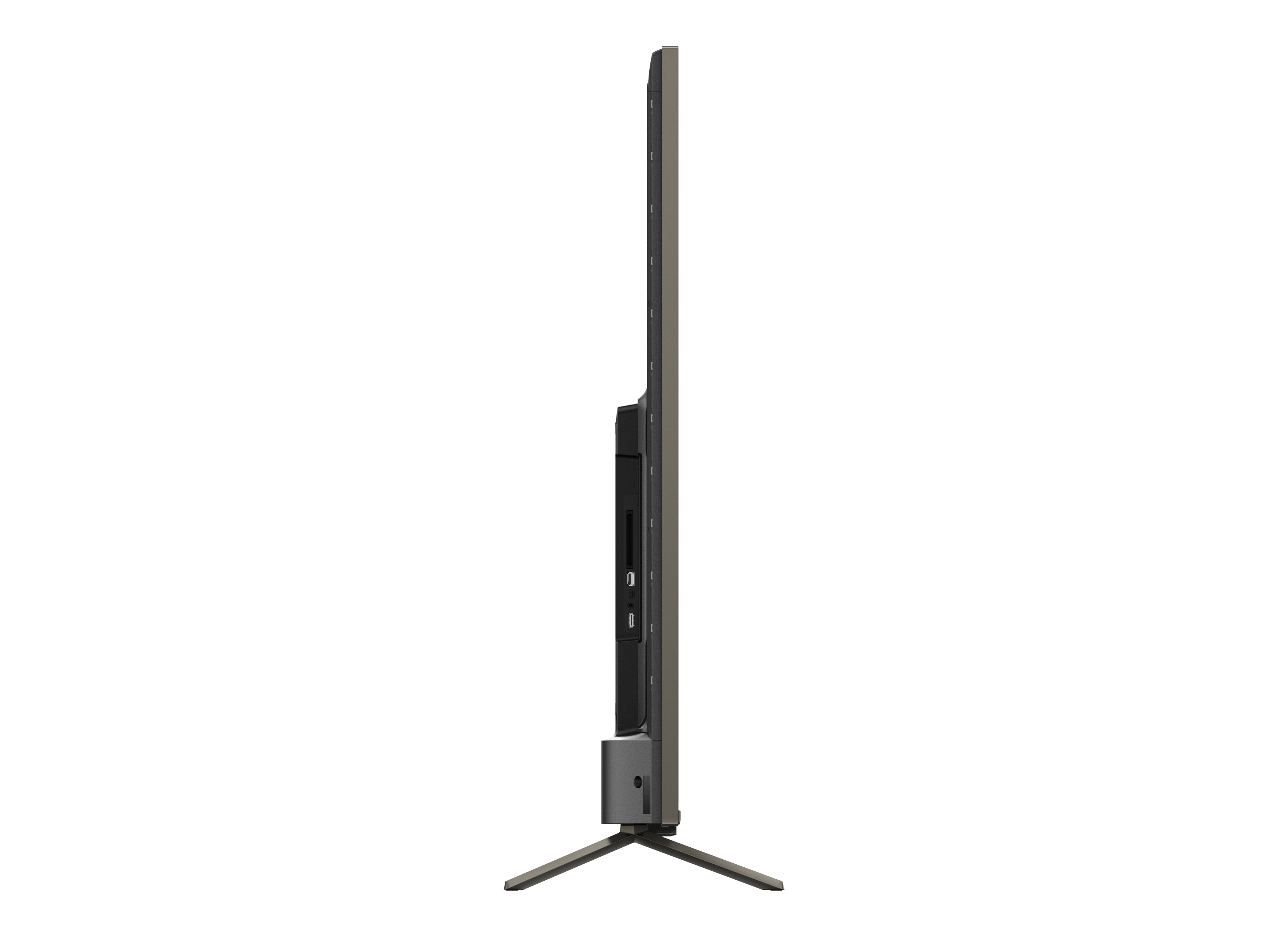 Una vista lateral de un televisor sobre un soporte. Es negro y tiene un soporte plateado.
