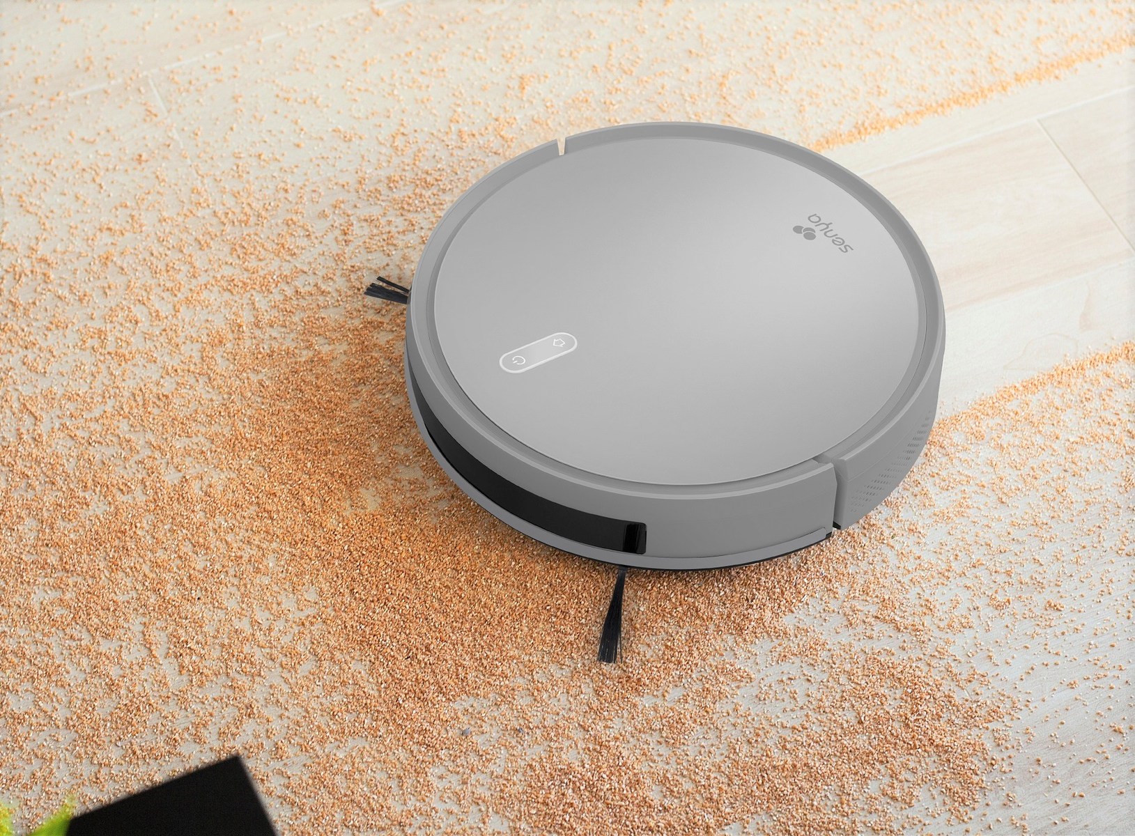 Grauer Roboter-Staubsauger auf einem Boden mit verstreuten Trümmern. Kreisförmige Form, Draufsicht.