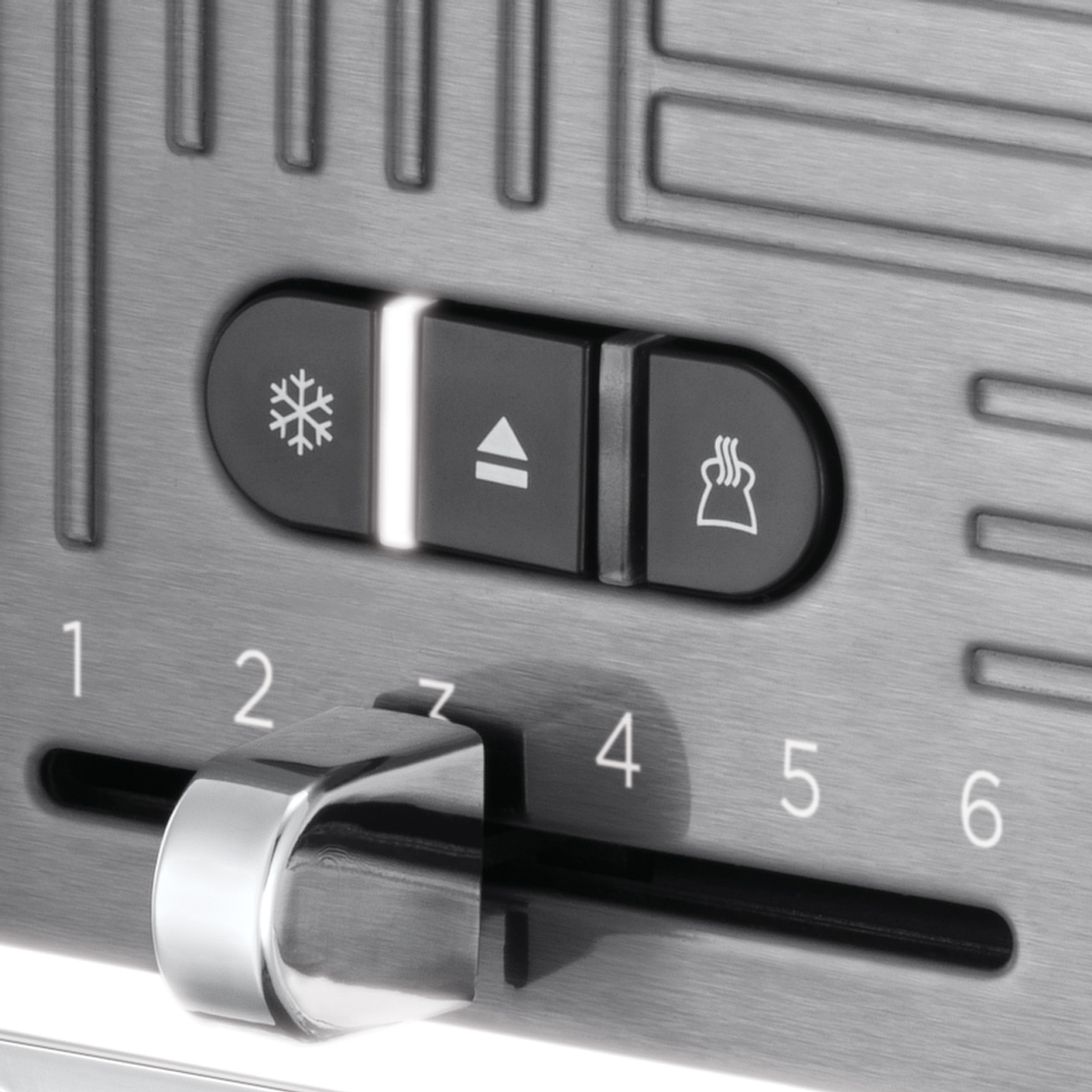 Zbliżenie panelu sterowania tostera. Posiada przyciski do rozmrażania, podgrzewania i ustawień stopnia zarumienienia.