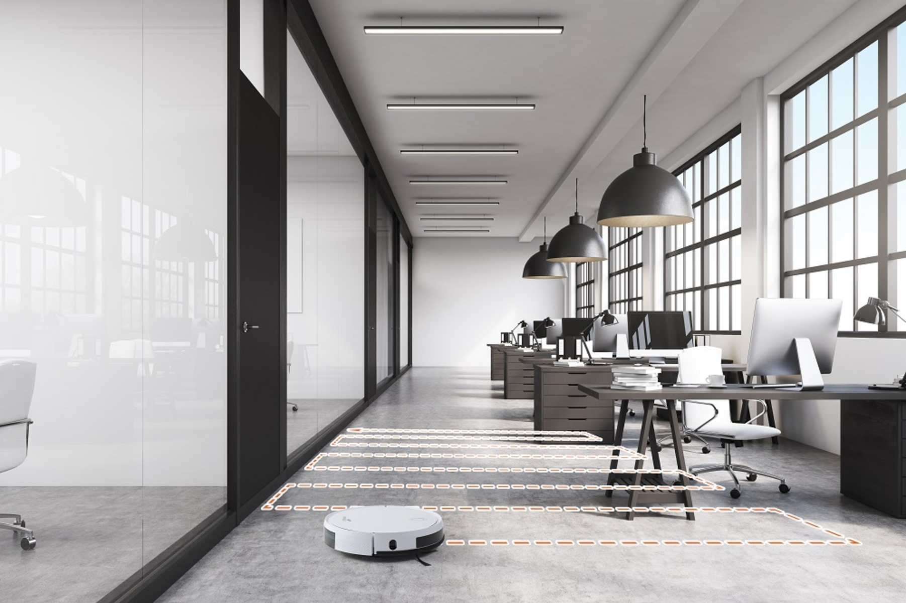 Ein Büro mit Schreibtischen, Stühlen und einem Roboter-Staubsauger, der den Boden reinigt. Hintergrund ist weiß.
