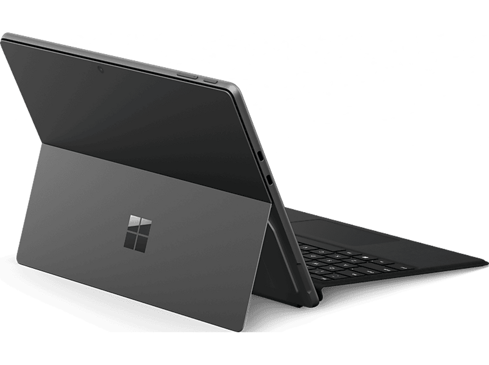 Laptop grigio con schermo aperto e tastiera su superficie scura.