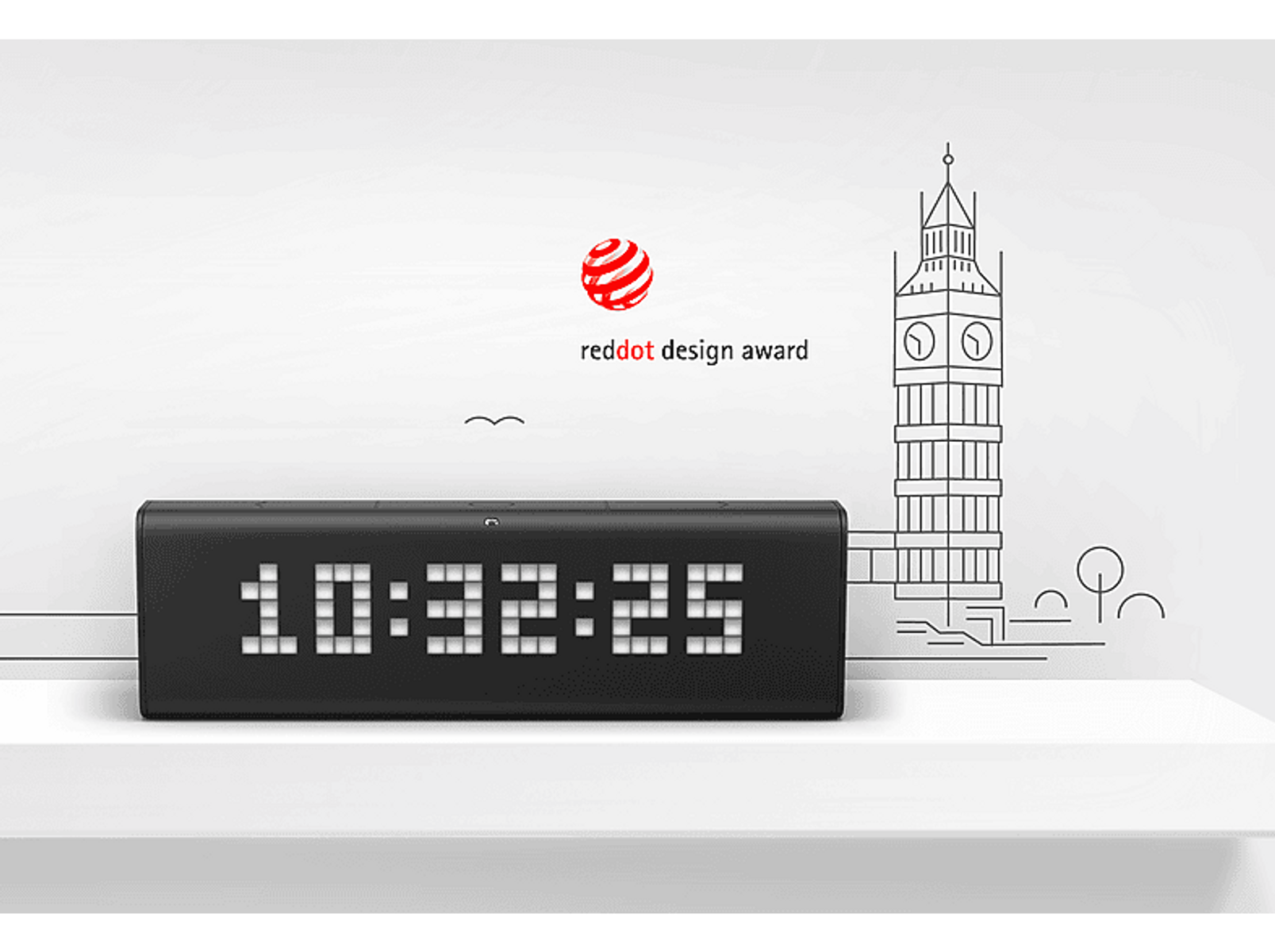 Une horloge noire avec un logo de prix Red Dot et le contour de Big Ben en arrière-plan.