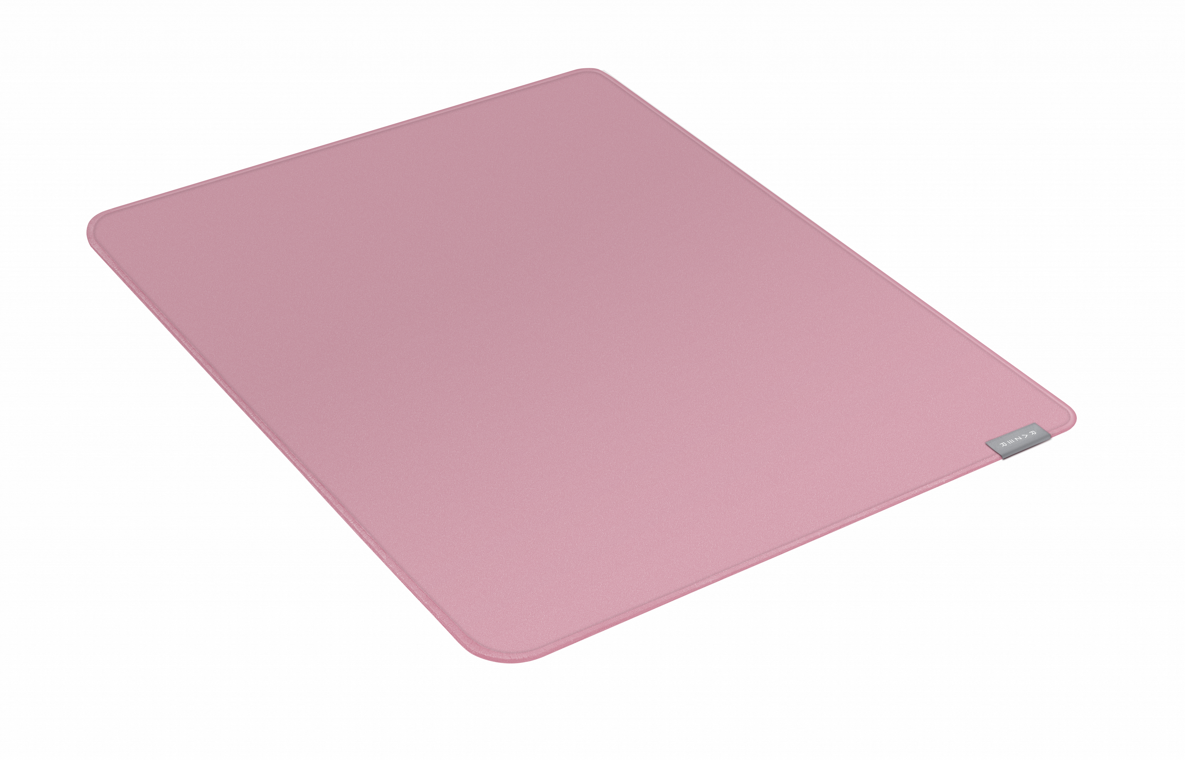 Rosa rechteckiges Mauspad mit abgerundeten Ecken, einem kleinen Etikett und weißem Hintergrund.