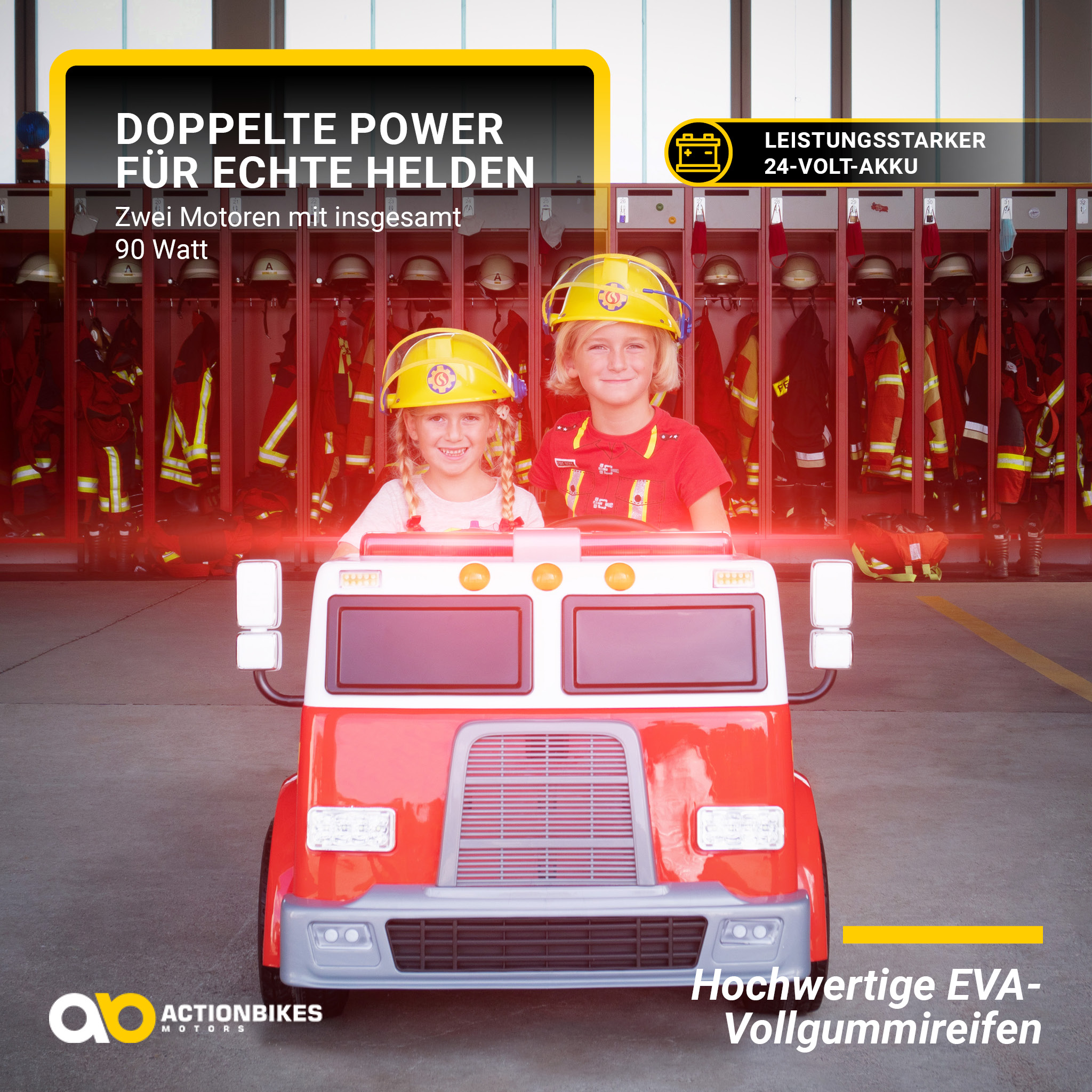 Zwei Kinder im Spielzeugfeuerwehrwagen. Hintergrund: Schränke und Feuerwehrausrüstung.