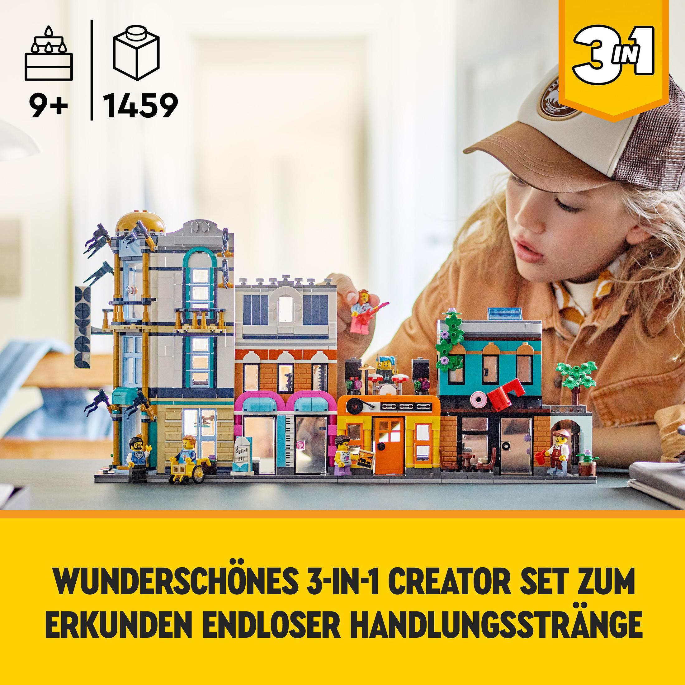 Een Lego Creator 3-in-1 set van kleurrijke herenhuizen, met een meisje dat ernaar kijkt.