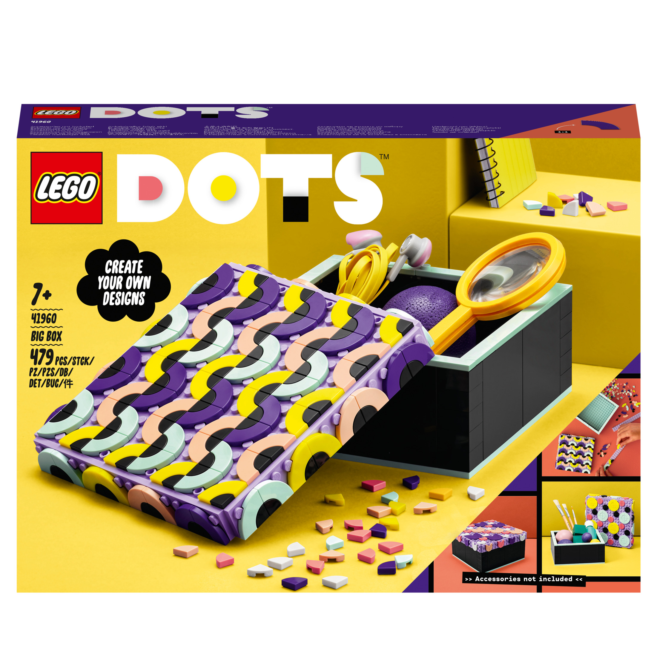 Lego Dots boxset. Bevat stippen, accessoires en een doos met deksel. Andere items staan op een gele ondergrond.