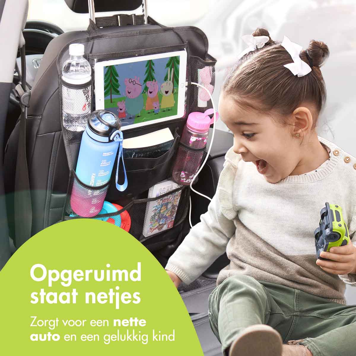 A young girl looks at a tablet screen showing Peppa Pig characters.