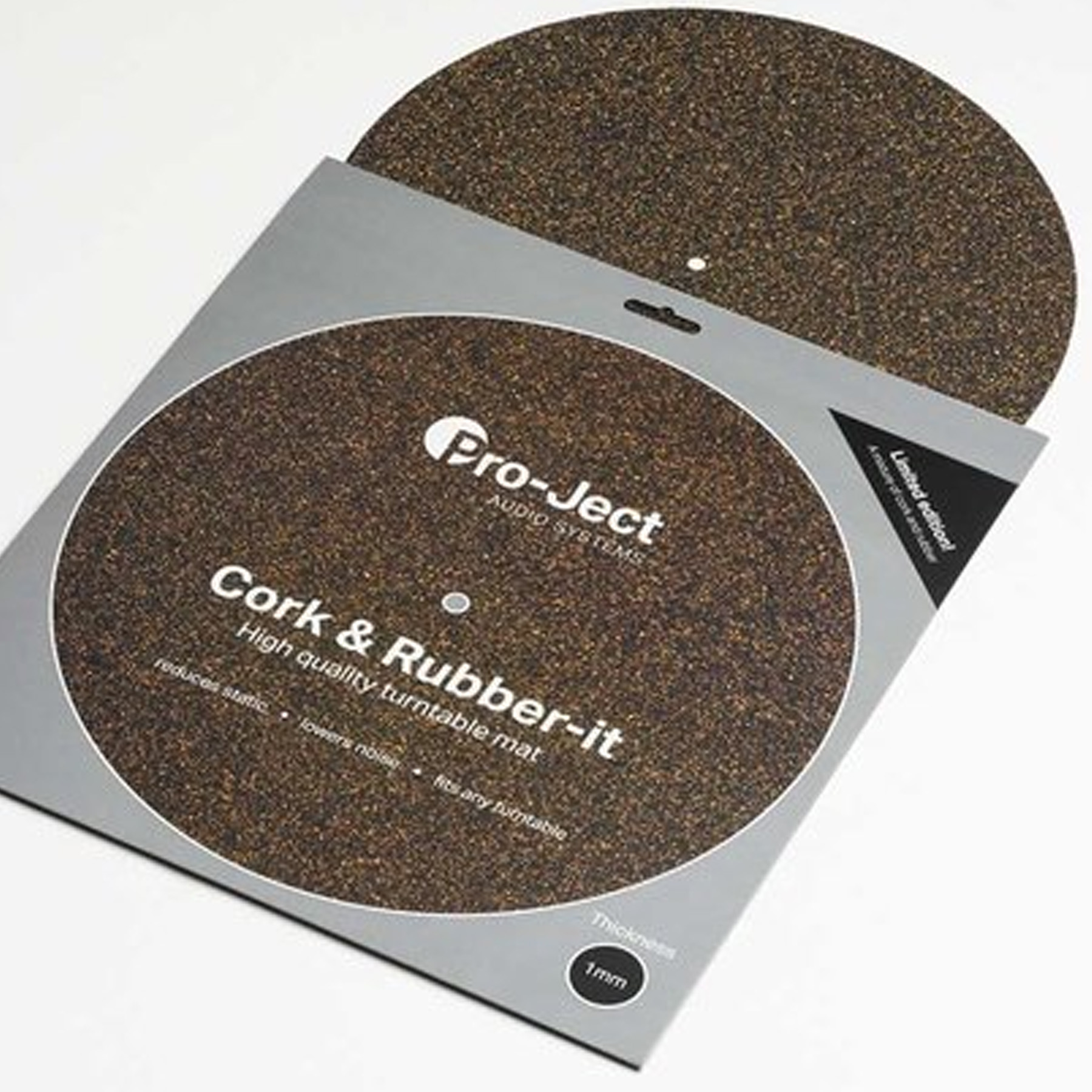 Turntable mat, cork and rubber, in a packaging, text visible on the surface.