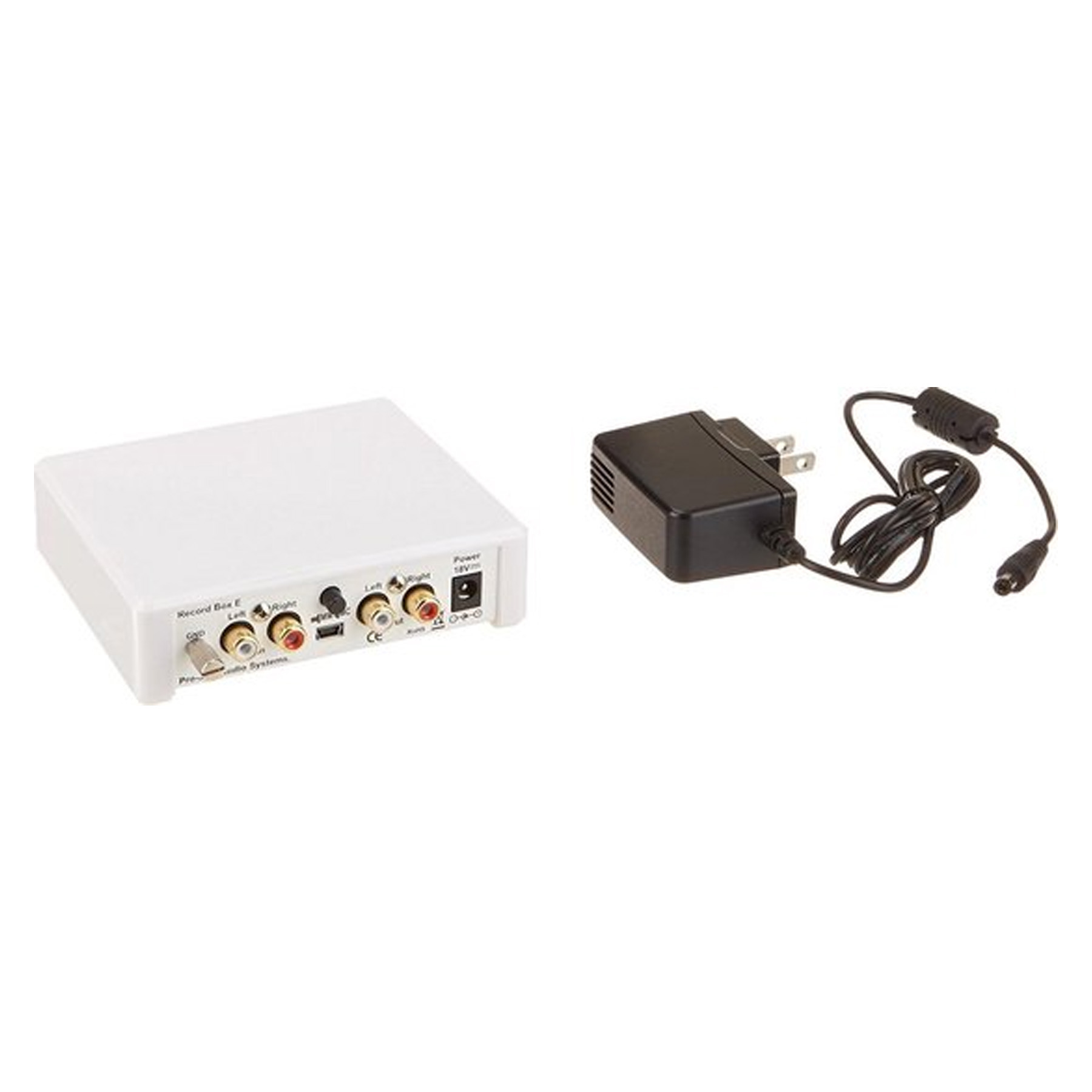Wit audiosysteem met voedingsadapter.