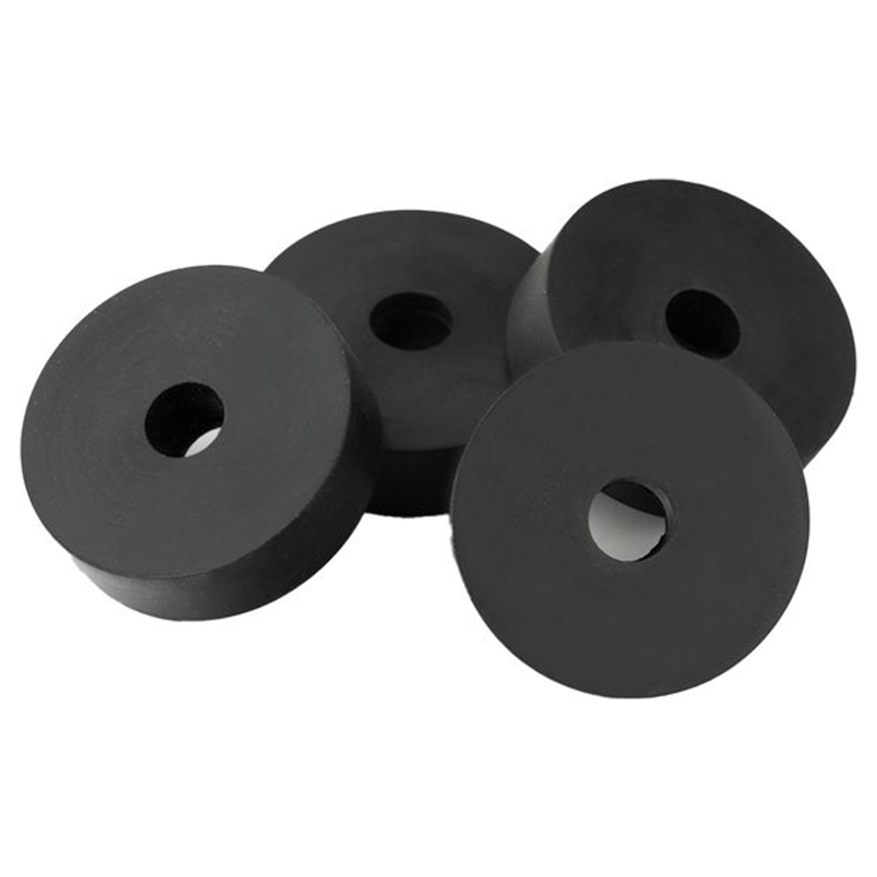 Four black rubber cushions, circular with a hole in the center.