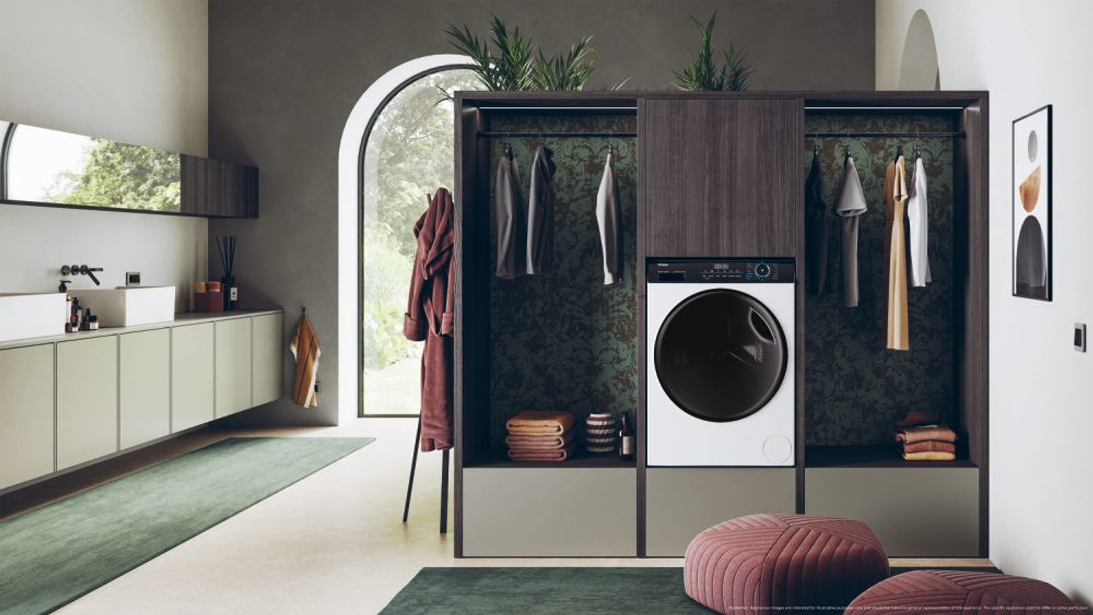 Un baño moderno con una lavadora integrada en un armario. Hay toallas y plantas.