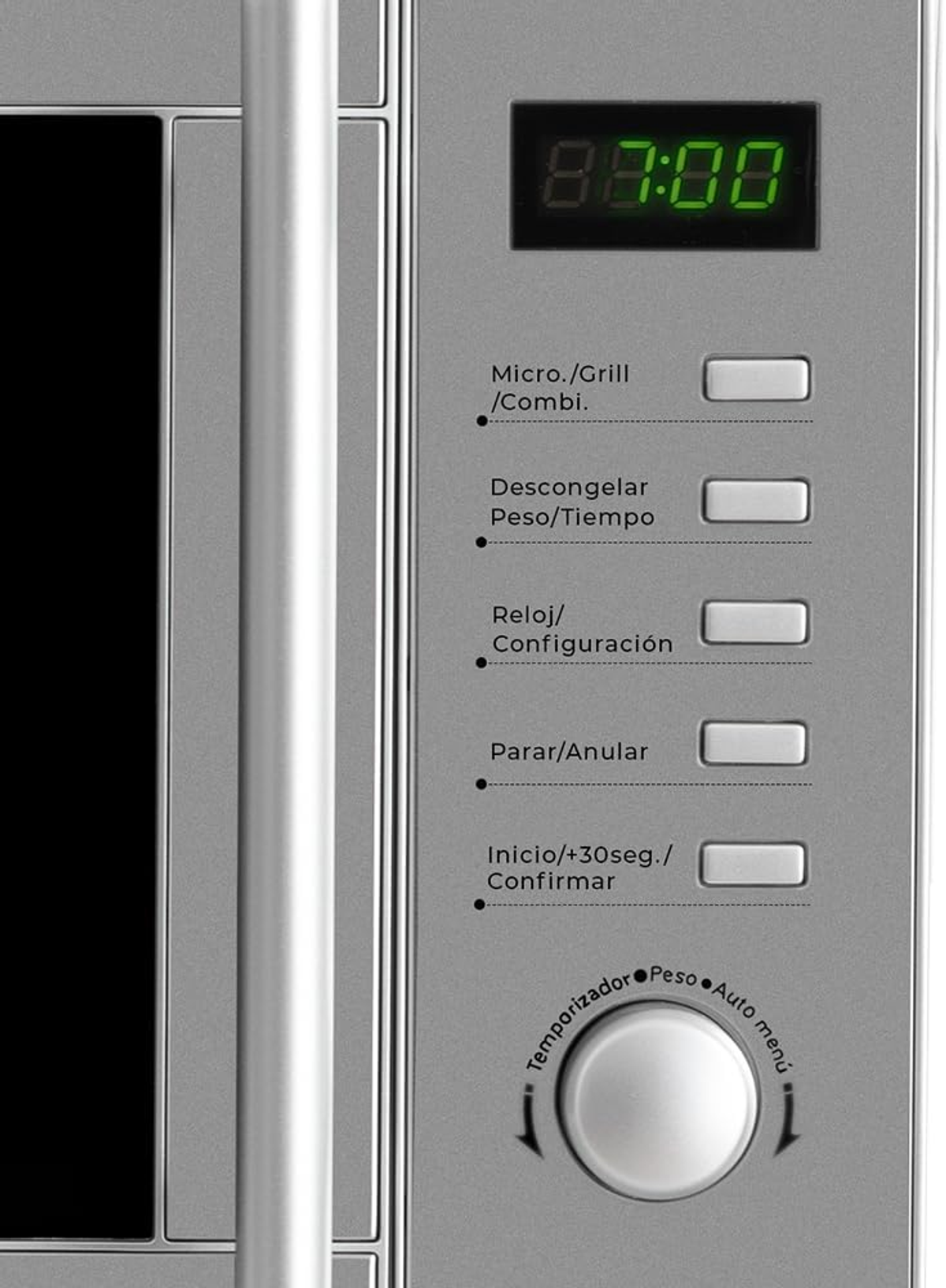 Pannello di controllo del microonde con pulsanti e display digitale. Colore argento.
