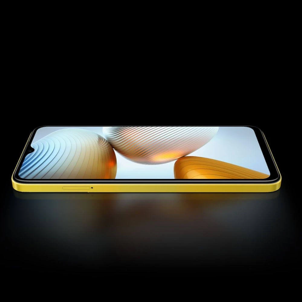Smartphone giallo su superficie scura, schermo con forme astratte. Sfondo nero.