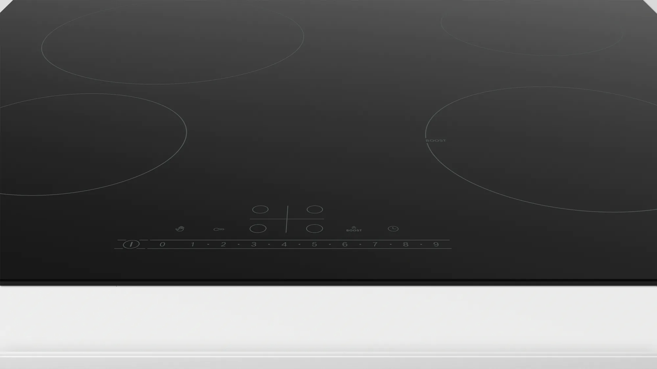 Płyta indukcyjna z czterema okrągłymi elementami grzejnymi i sterowaniem dotykowym.