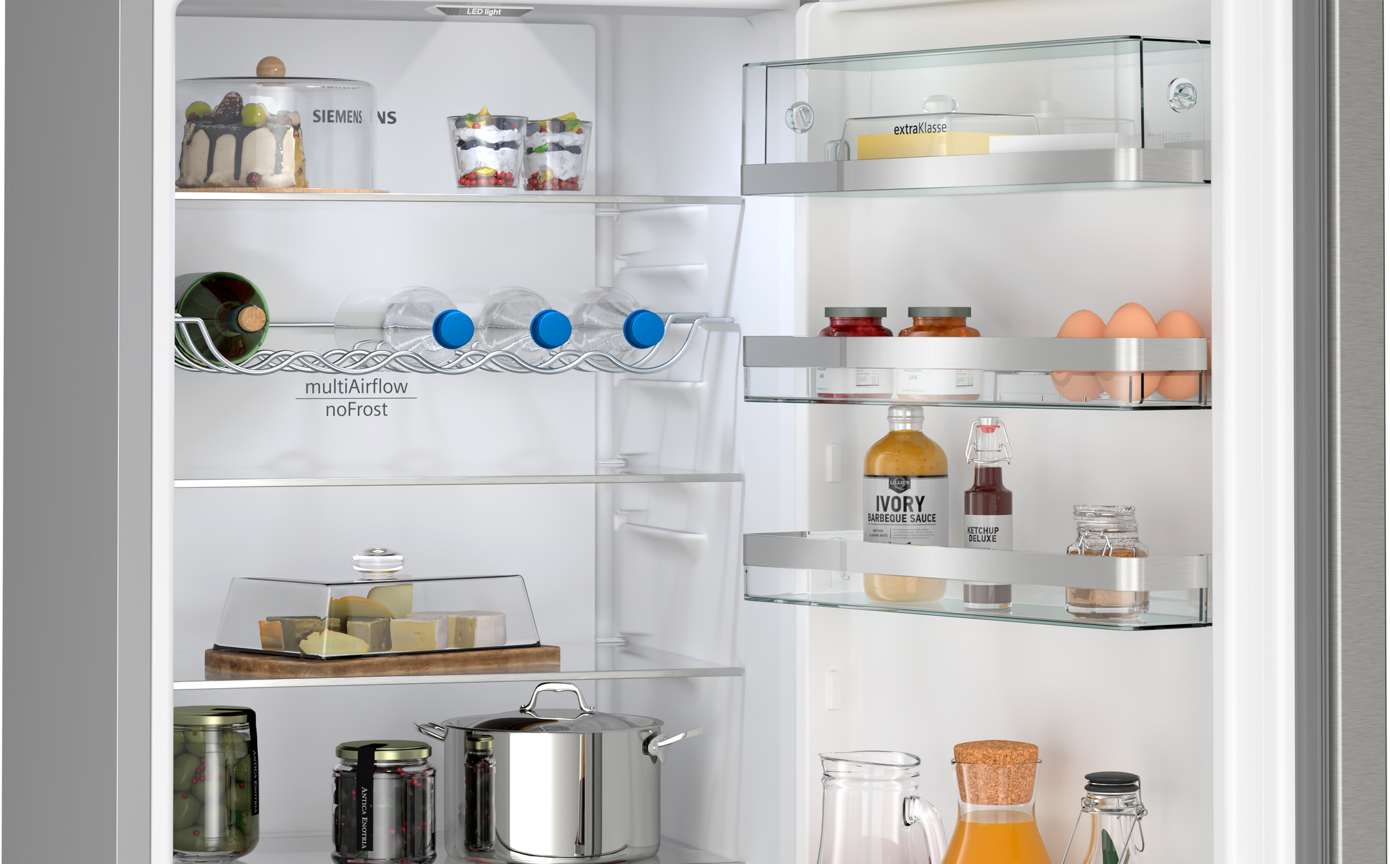 Refrigerator interior with shelves of food and drinks. Includes cake, cheese, eggs, and drinks.